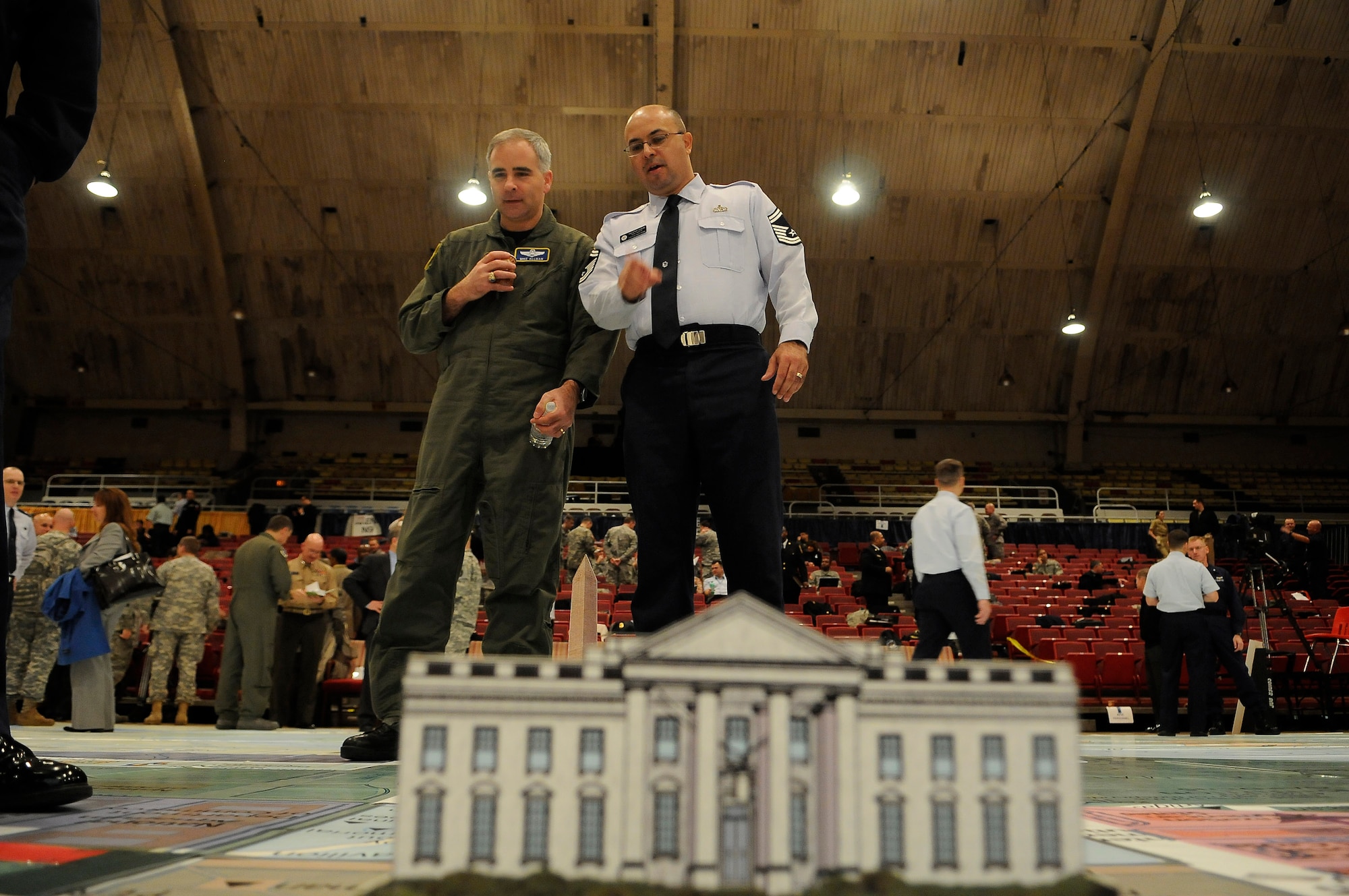 Members of the Armed Forces Inaugural Committee participate in a large-scale map exercise Dec. 18 in Washington, D.C. AFIC carries on a tradition, which dates back more than 200 years, of honoring the new commander in chief and recognizing civilian control of the military. AFIC is a joint-service organization responsible for providing military ceremonial support to the 56th Inauguration Day, which will take place on Jan. 20. (Department of Defense photo/Petty Officer 1st Class Daniel J. Calderon)