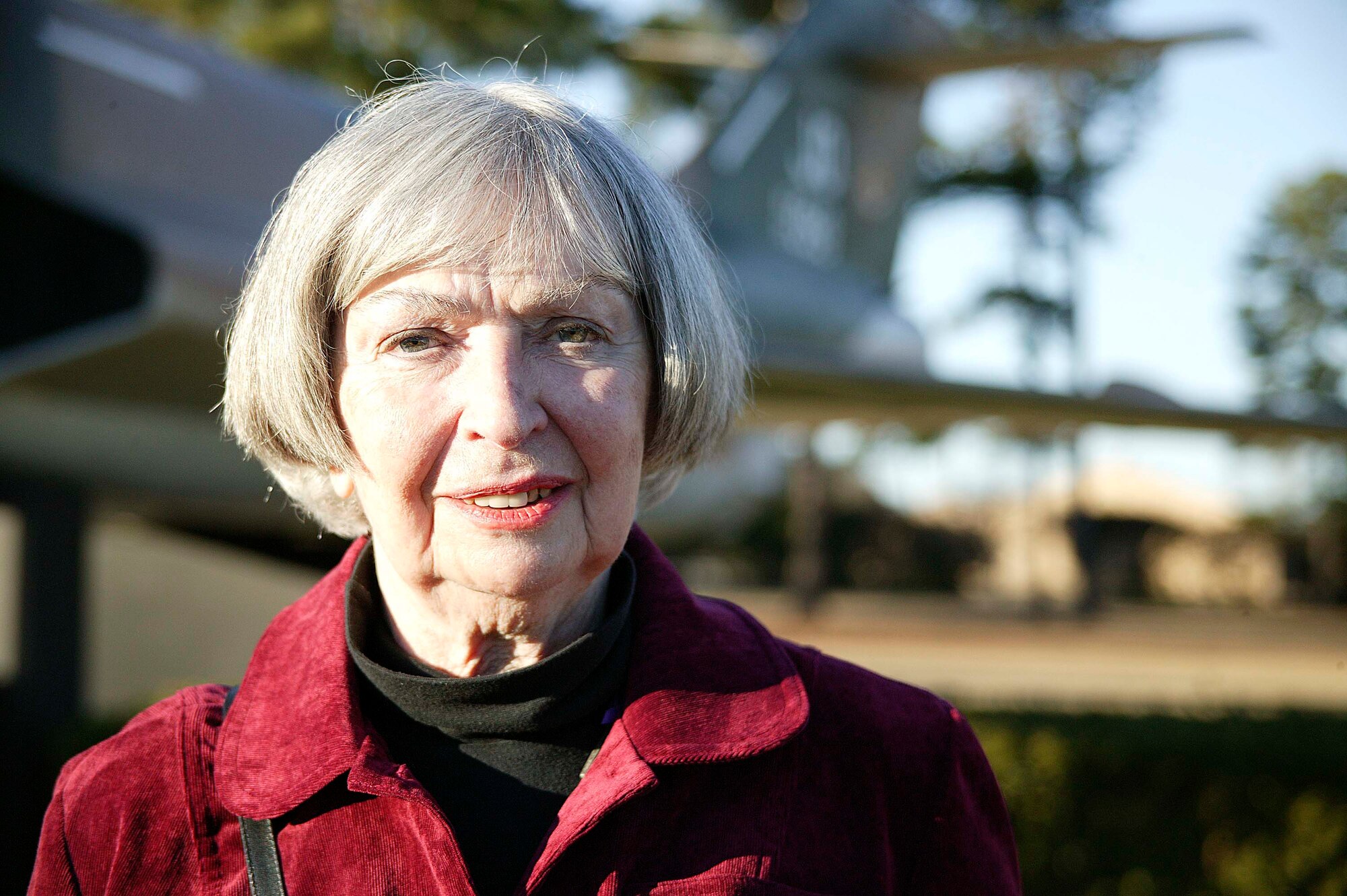 SHAW AIR FORCE BASE, S.C.-- Mary Ellen Arbuckle stands in front of a static-displayed F-101B interceptor at Shaw Dec. 30. Mary Ellen brought her three children, daughter-in-law and four grandchildren to share the memory of her beloved husband, Retired Major Donald Arbuckle, who was an F-101B pilot. (U.S. Air Force photo/Staff Sgt. Holly Brown)