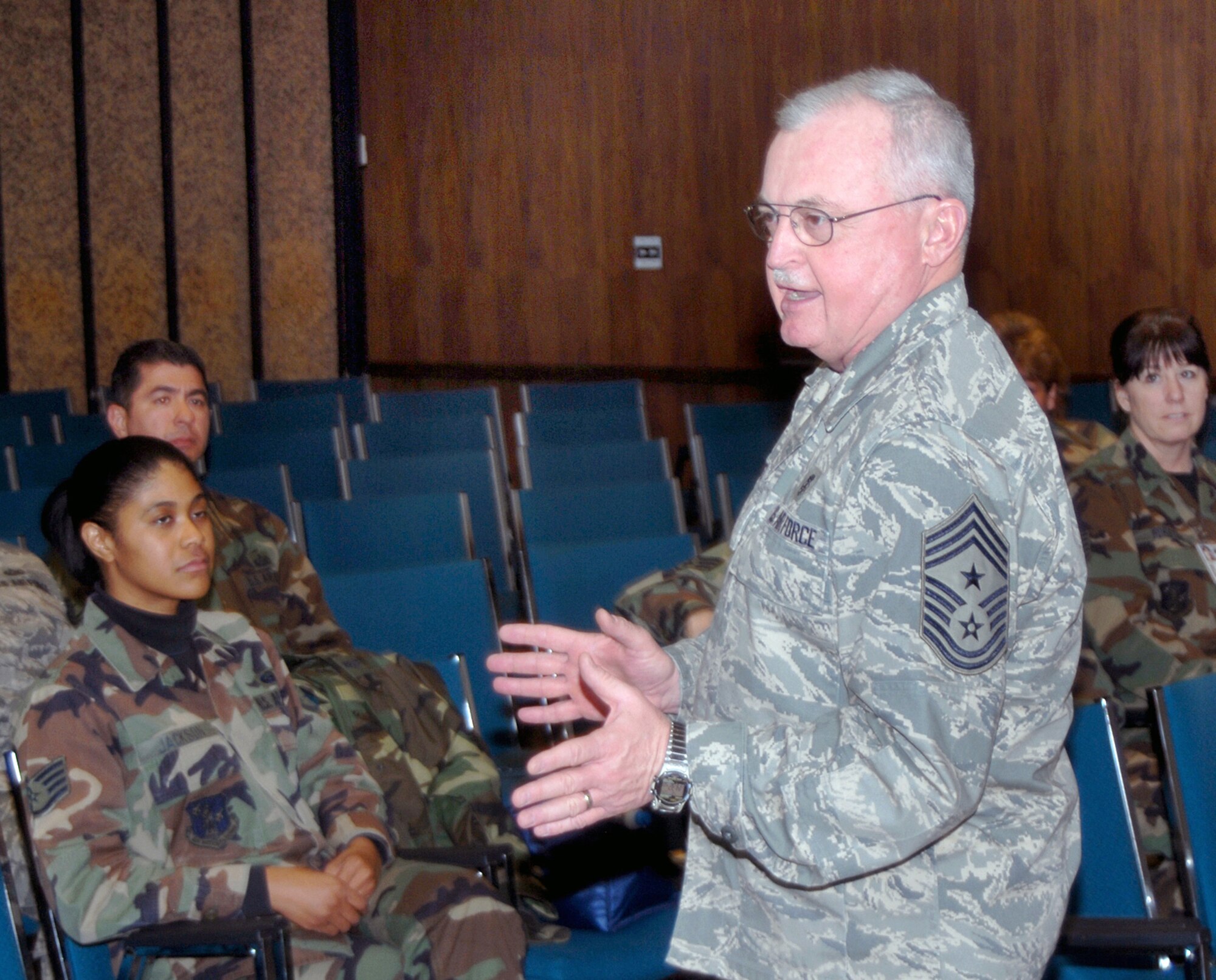 Chief Master Sgt. Richard Smith, Air National Guard command chief master sergeant, speaks to military personnel at the Air Reserve Personnel Center in Denver, Colo. Chief Smith said he was impressed by the Total Force work force at ARPC. (U.S. Air Force photo/Kirk Jamison)