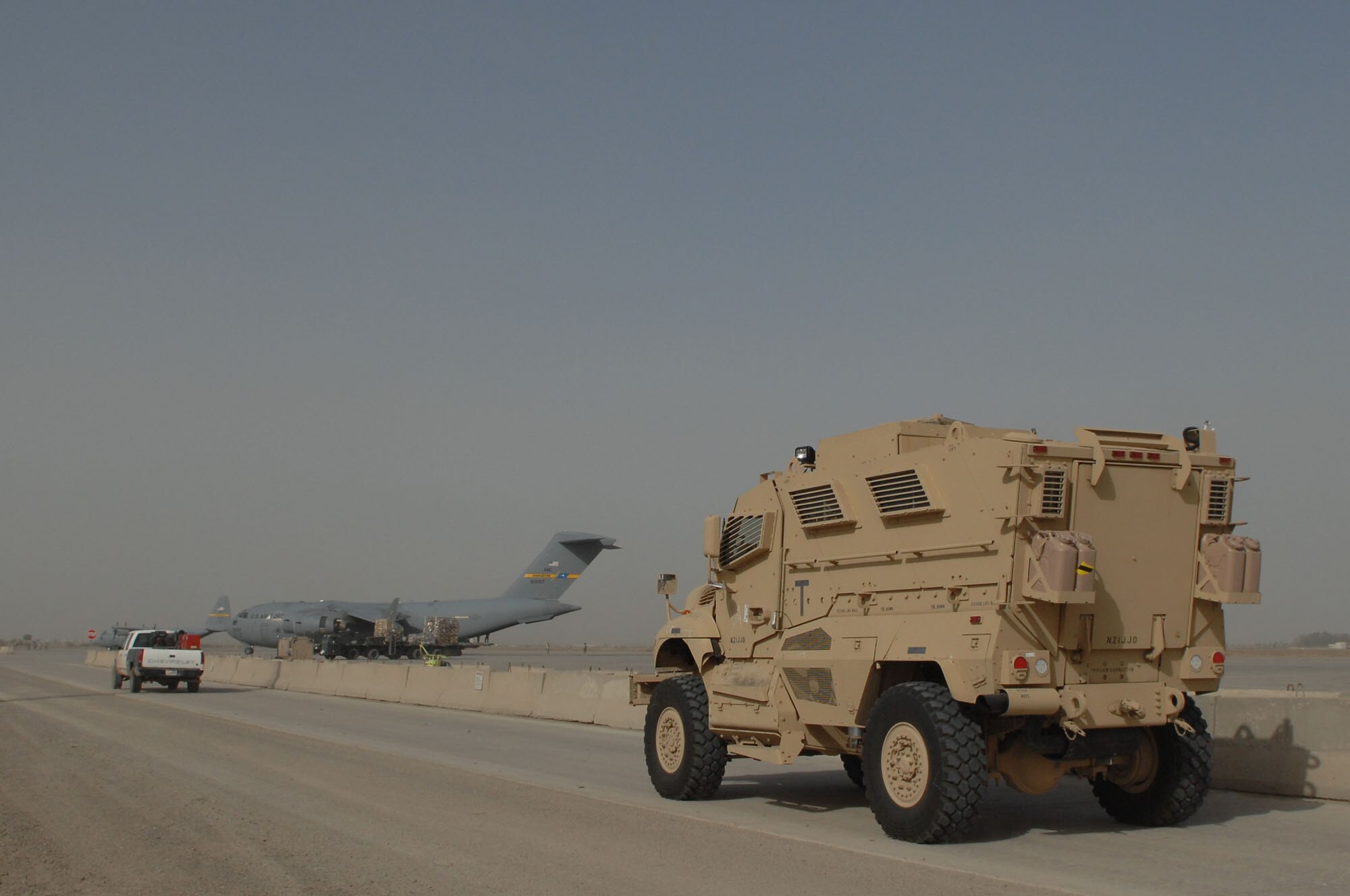 A Mine Resistant Ambush Protected (MRAP) vehicle is driven to a refueling station after being delivered to Sather Air Base, Iraq, on January 30, 2008. The delivery is part of a Defense Department initiative to purchase additional  MRAPs by July 31. (U.S. Air Force photo by Tech. Sgt. Jeffrey Allen)
