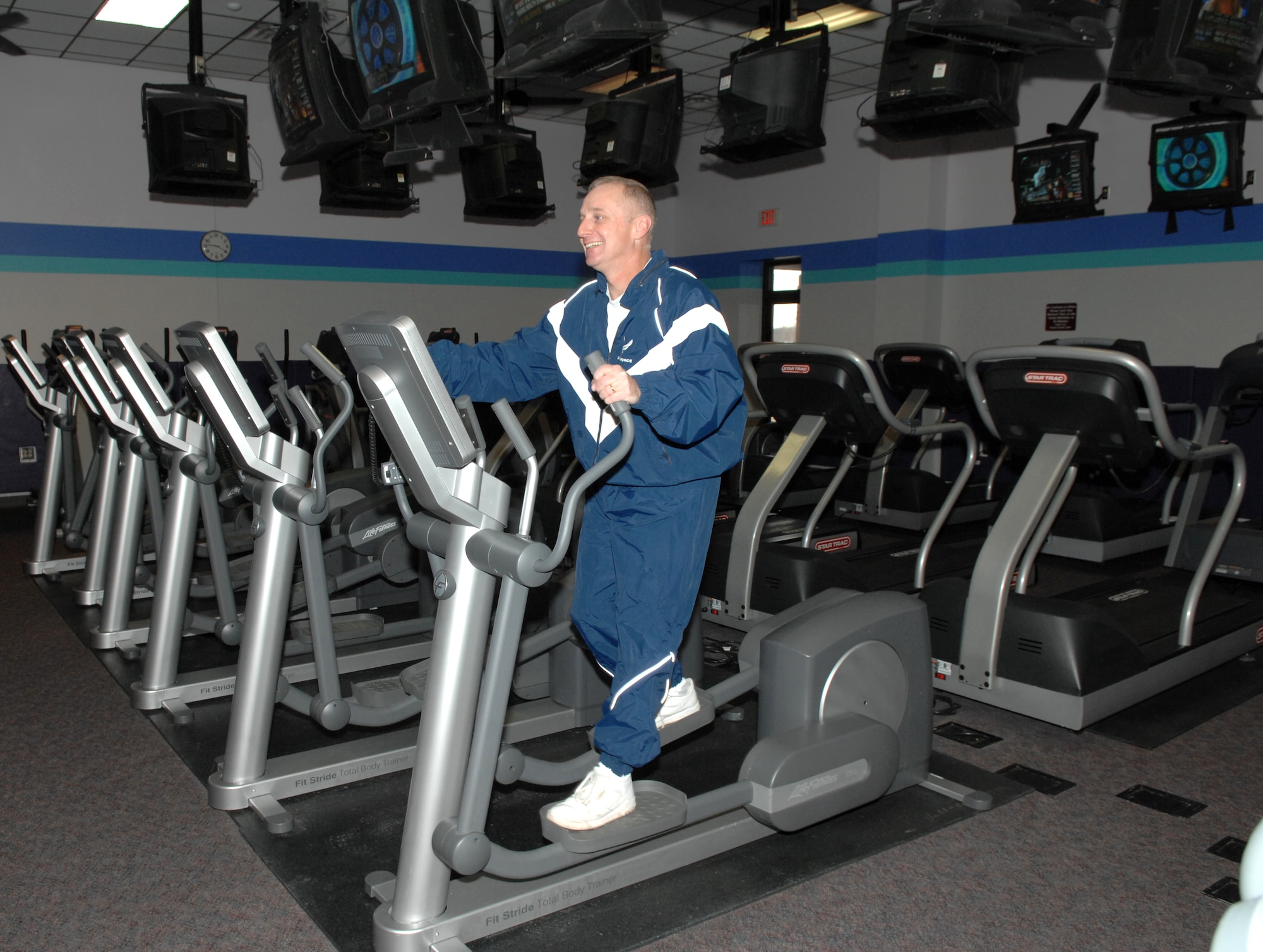Brig. Gen Garret Harencak, 509th Bomb Wing Commander uses the elliptical machine on his quest to become Whiteman’s biggest loser.  Whiteman's biggest loser will kickoff Friday, Feb. 1 with initial weigh-ins conducted Feb. 1, 4 and 8.   It also has some bonuses such as prizes! A television for the grand prize winners plus a runner up prizes! Our nicest HAWC Duffle bag stuffed with every incentive item we offer, squadron recognition for the group that looses the largest percent of weight from the wing commander himself and bragging rights! 
There is also an information/education packet plus a HAWC Ball Cap given to everyone who registers!  (U.S. Air Force photo/ Airman 1st Class Stephen Linch)