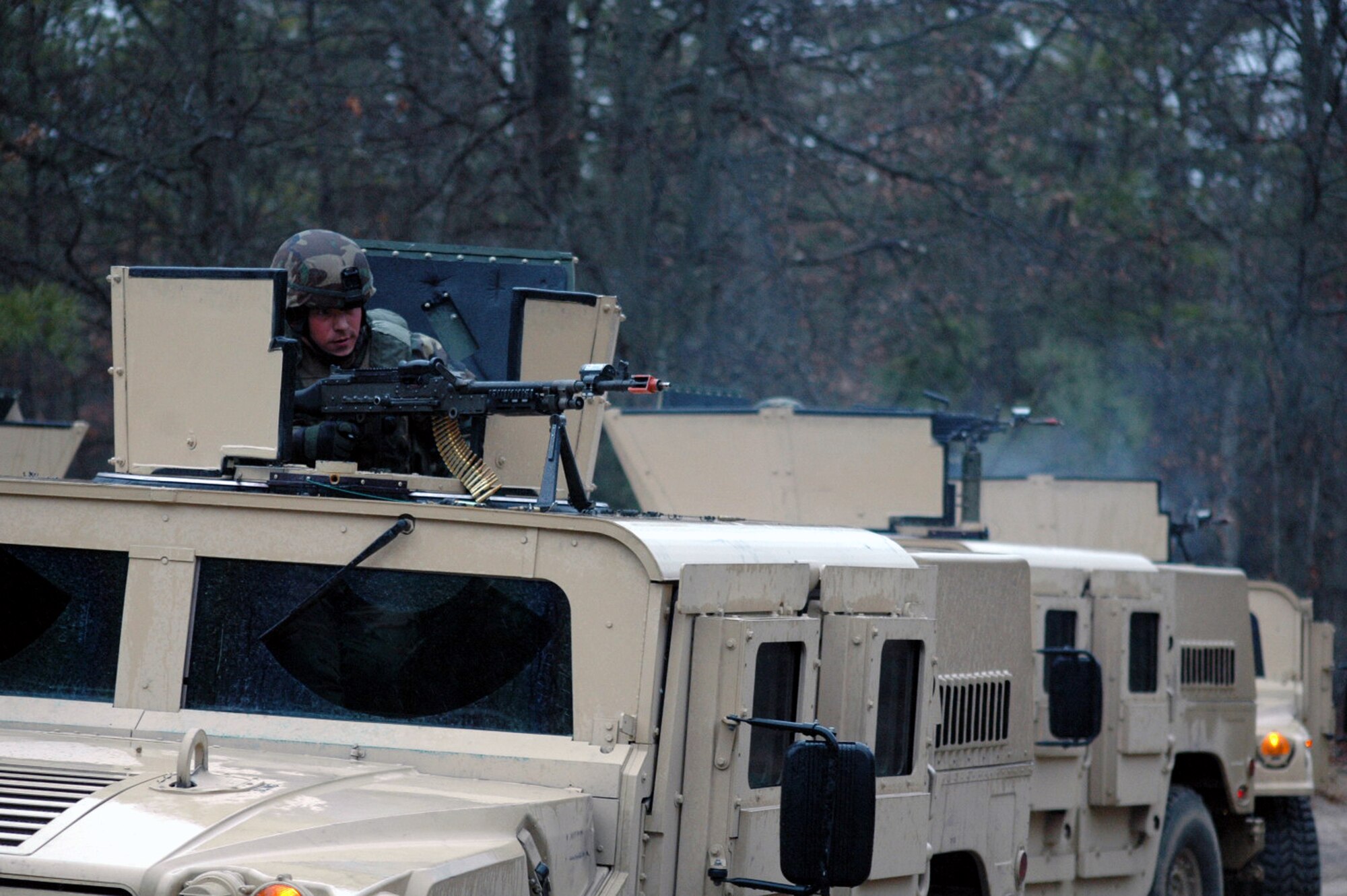 Students in the Air Force Phoenix Warrior Training Course 08-2 practice a convoy scenario during training on a range on Naval Air Engineering Station Lakehurst, N.J., Jan. 22, 2008.  Phoenix Warrior is taught by the U.S. Air Force Expeditionary Center's 421st Combat Training Squadron at Fort Dix, N.J.  (U.S. Air Force Photo/Tech. Sgt. Scott T. Sturkol)