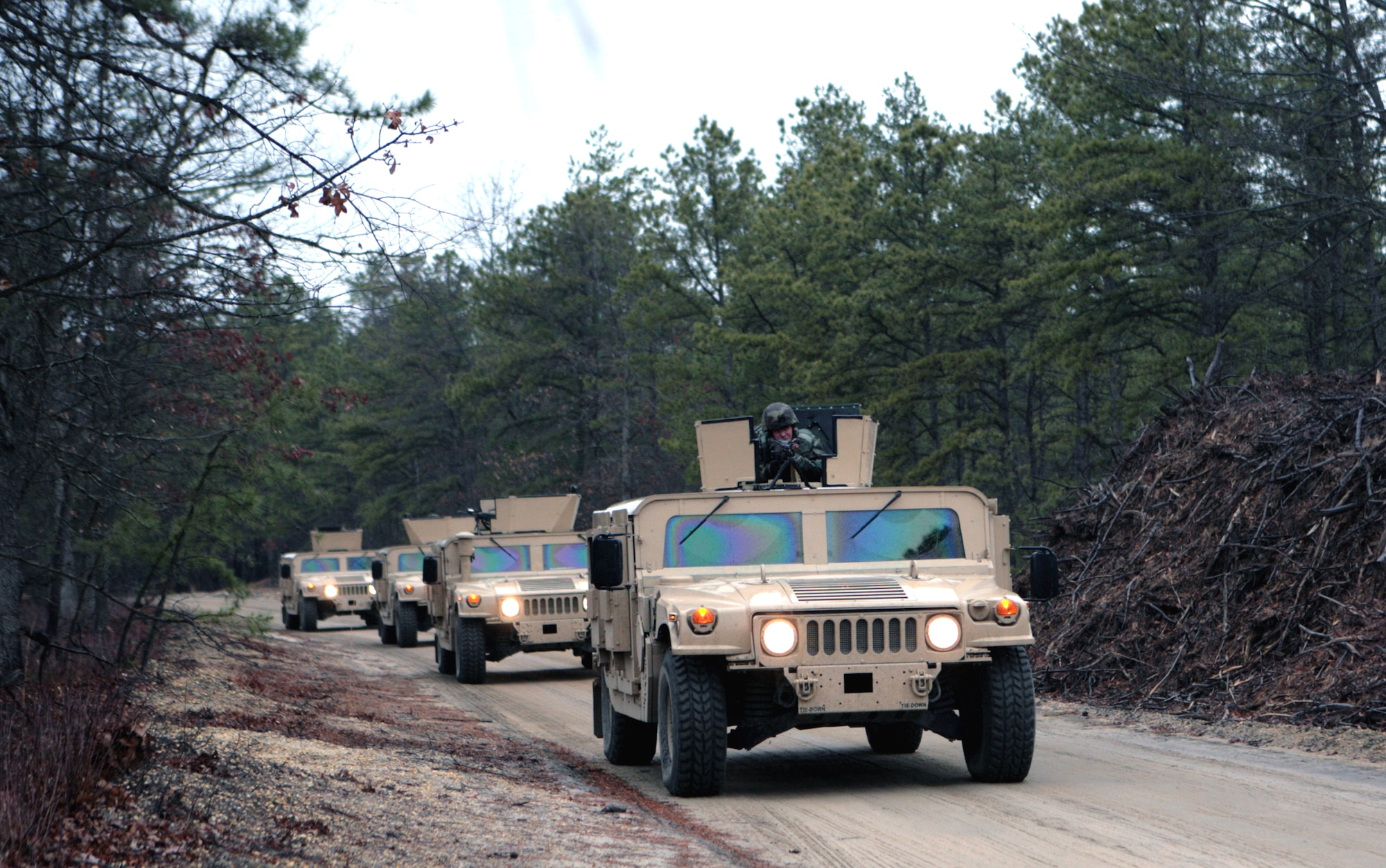 Students in the Air Force Phoenix Warrior Training Course 08-2 practice a convoy scenario during training on a range on Naval Air Engineering Station Lakehurst, N.J., Jan. 22, 2008.  Phoenix Warrior is taught by the U.S. Air Force Expeditionary Center's 421st Combat Training Squadron at Fort Dix, N.J.  (U.S. Air Force Photo/Master Sgt. Bob Lorusso)