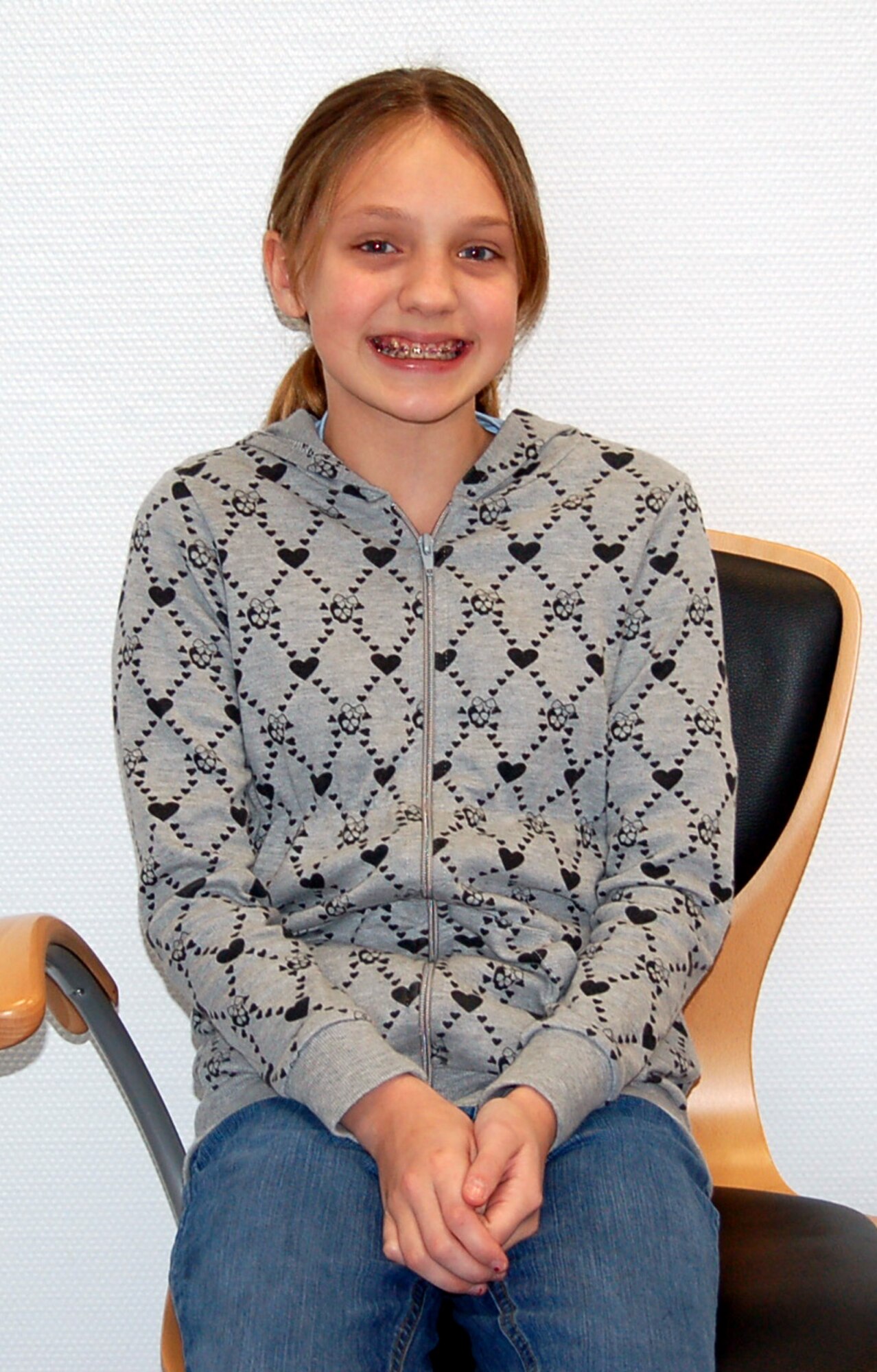 SPANGDAHLEM AIR BASE, Germany -- Keegan Ludwig, daughter of Master Sgt. James Ludwig, 52nd Missions Support Group, spent her time during Job Shadow Day at the vet clinic. The best part of her day was assisting with a check up for two dogs. (Photo by Sequoia Montgomery)