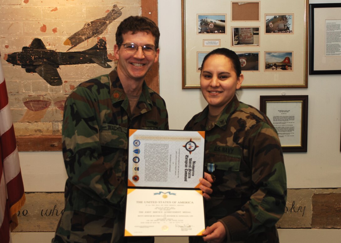 The Joint Service Achievement Medal (JSAM) was awarded to Seaman Jennifer Gonzales on the 31st of January 2008 by LCDR Robert Wachtel. Seaman Gonzales' home state is New Mexico. (U. S. Air Force Photo by Technical Sgt. Casey Martin)