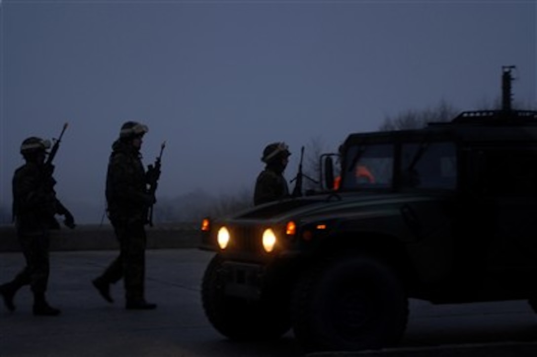 U.S. Air Force security personnel prepare for convoy training in Baumholder Germany, on Jan 30, 2008.  The airmen are participating in the Creek Defender course held by the 786th Security Forces Squadron.  The course covers an array of tactical training methods that security forces members will use in a deployed environment.  