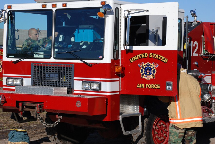 932nd Airlift Wing firefighters constantly practice to stay ready.  Here they respond to a simulated call from a house on the other side of the base to test response time.  Call 1-800-257-1212 to find out more about becoming an Air Force Reserve Command firefighter.  Photo/Tech. Sgt. Danny Oliver