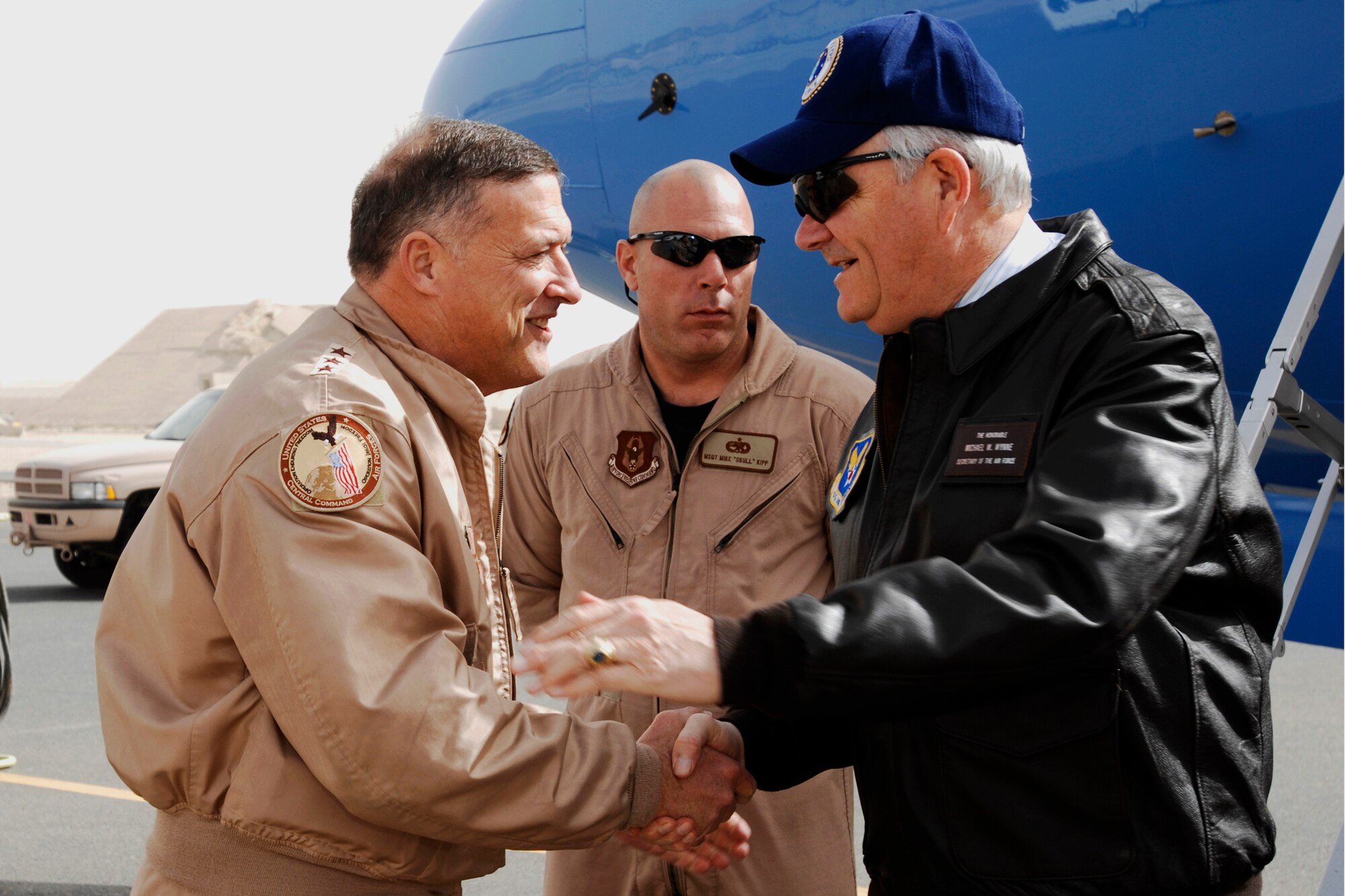 SOUTHWEST ASIA -- Lt. Gen. Gary North, U.S. Central Command Air Forces commander (left), greets Secretary of the Air Force Michael Wynne, Feb. 1, 2008, during the SECAF’s visit to an air base in the Persian Gulf Region. The SECAF spoke with more than 400 Airmen during his visit and gained greater insight on the 6,800 plus Airmen deployed throughout Southwest Asia in non-traditional Air Force functions supporting Operation Iraqi Freedom. (U.S. Air Force photo/ Staff Sgt. Patrick Dixon)