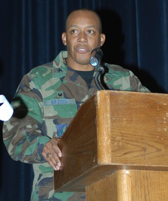 KUNSAN AIR BASE, South Korea -- Col. C.Q. "Wolf" Brown, 8th Fighter Wing commander speaks at the new theater grand opening here Feb. 1.  The new theater has 200 more seats than the previous theater that was built in 1962.  The increase in capacity will enable the Wolf Pack to accept follow on forces more efficiently.  (U.S. Air Force photo/Staff Sgt. Darcie Ibidapo)