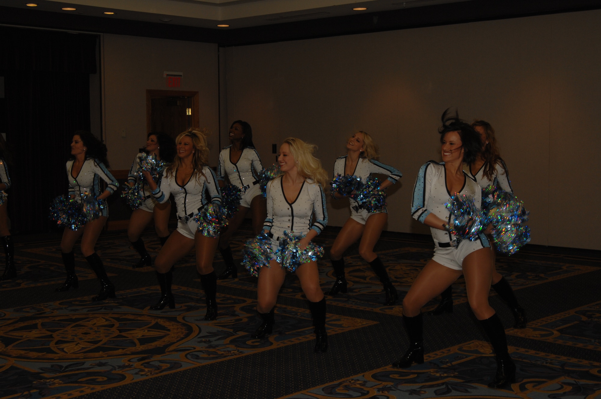 WHITEMAN AIR FORCE BASE, Mo--- Kansas City Brigade Cheerleaders perform for Team Whiteman during the Superbowl half time at Mission's End, Feb 3. (U.S. Air Force photo/ Senior Airman Stephanie Clark)