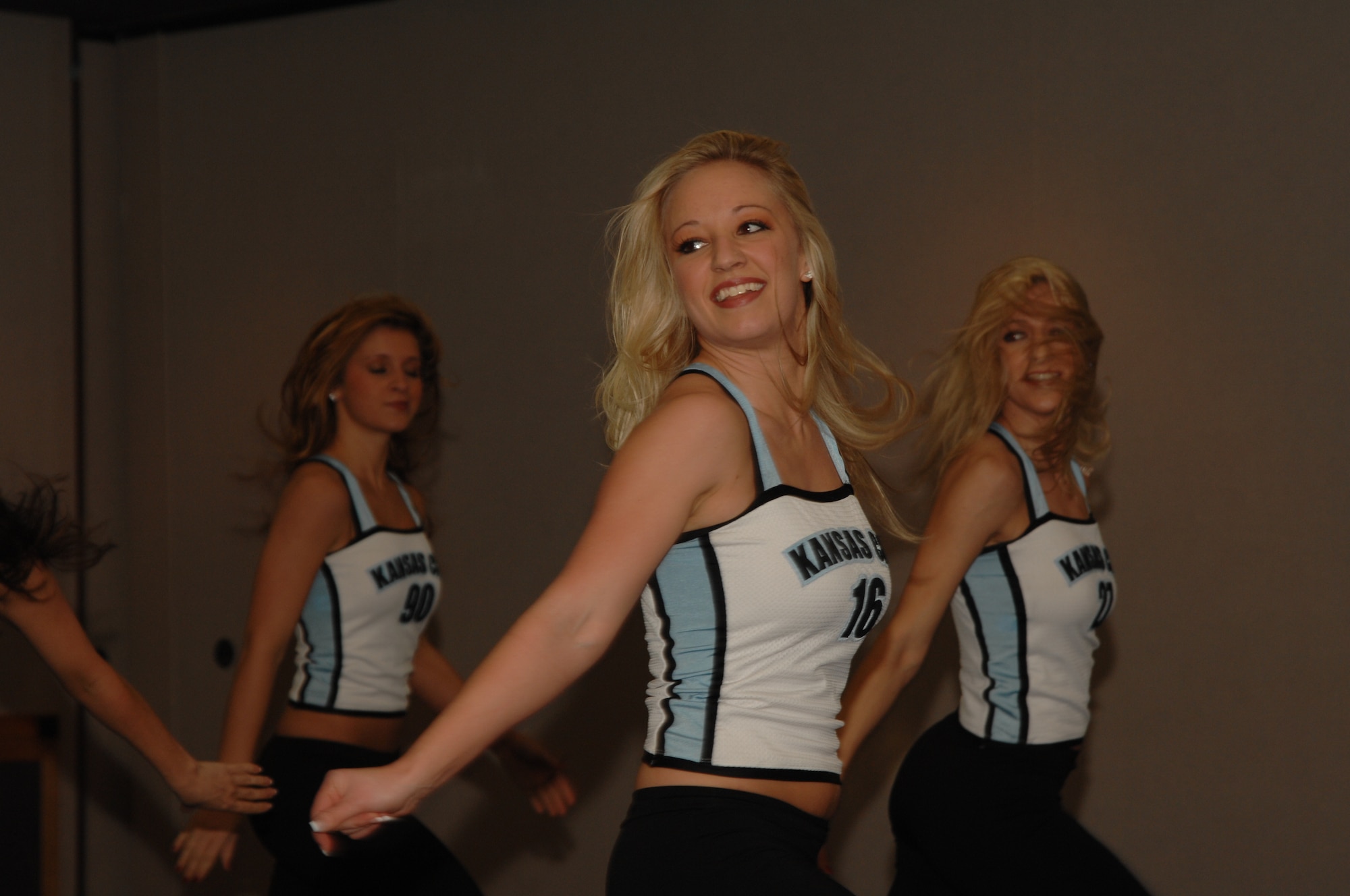 WHITEMAN AIR FORCE BASE, Mo--- Kansas City Brigade Cheerleaders perform for Team Whiteman during the Superbowl half time at Mission's End, Feb 3. With a final score of 17-14, the New York  Giants defeated the New England Patriots at Super Bowl XLII. (U.S. Air Force photo/ Senior Airman Stephanie Clark)