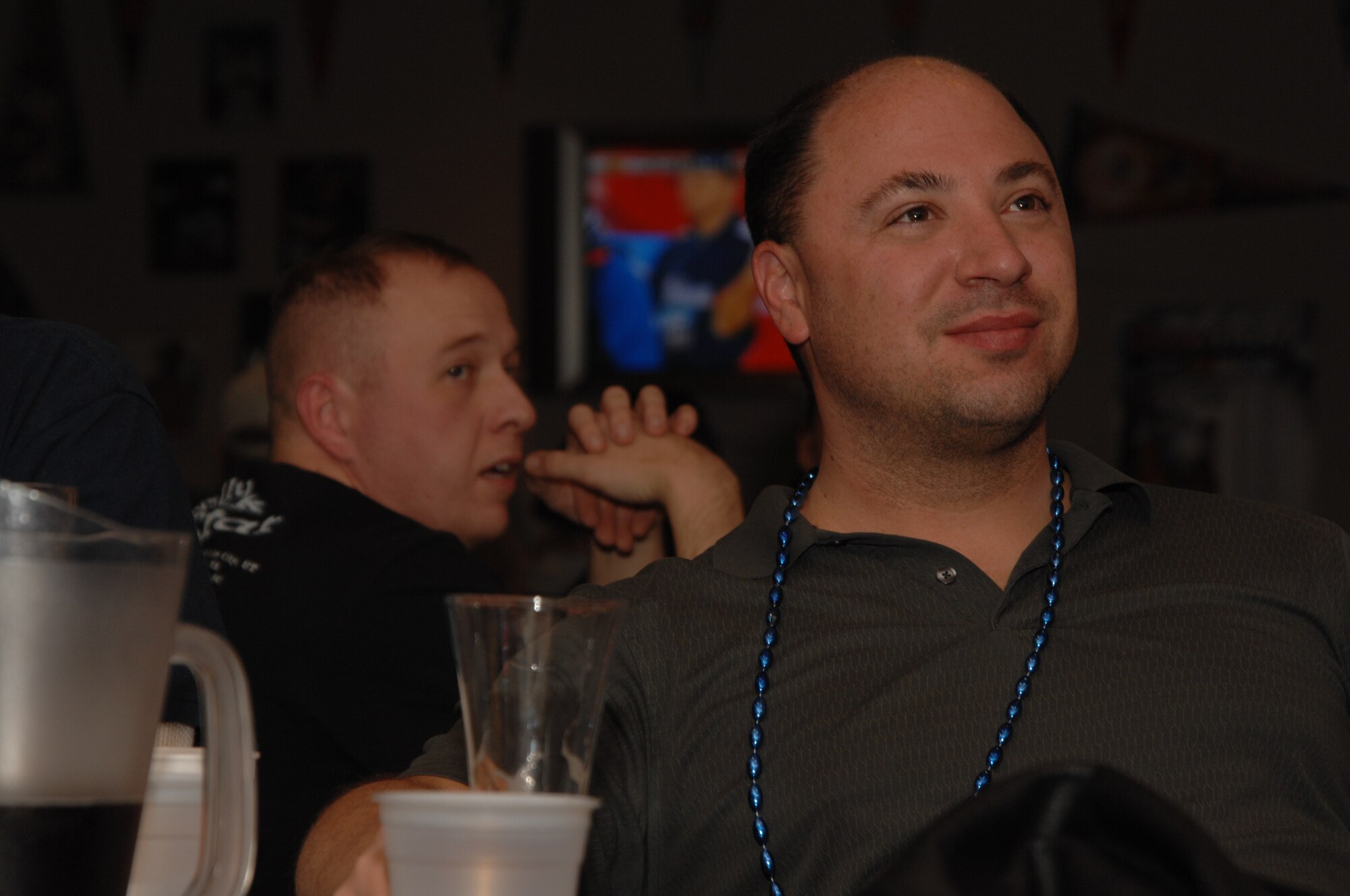 WHITEMAN AIR FORCE BASE, Mo.— Capt. Clayton Allmon, 509th Communications Squadron, watches the Superbowl with friends at Mission's End, which was open for the Superbowl festivities, Feb. 3 (U.S. Air Force photo/ Senior Airman Stephanie Clark)
