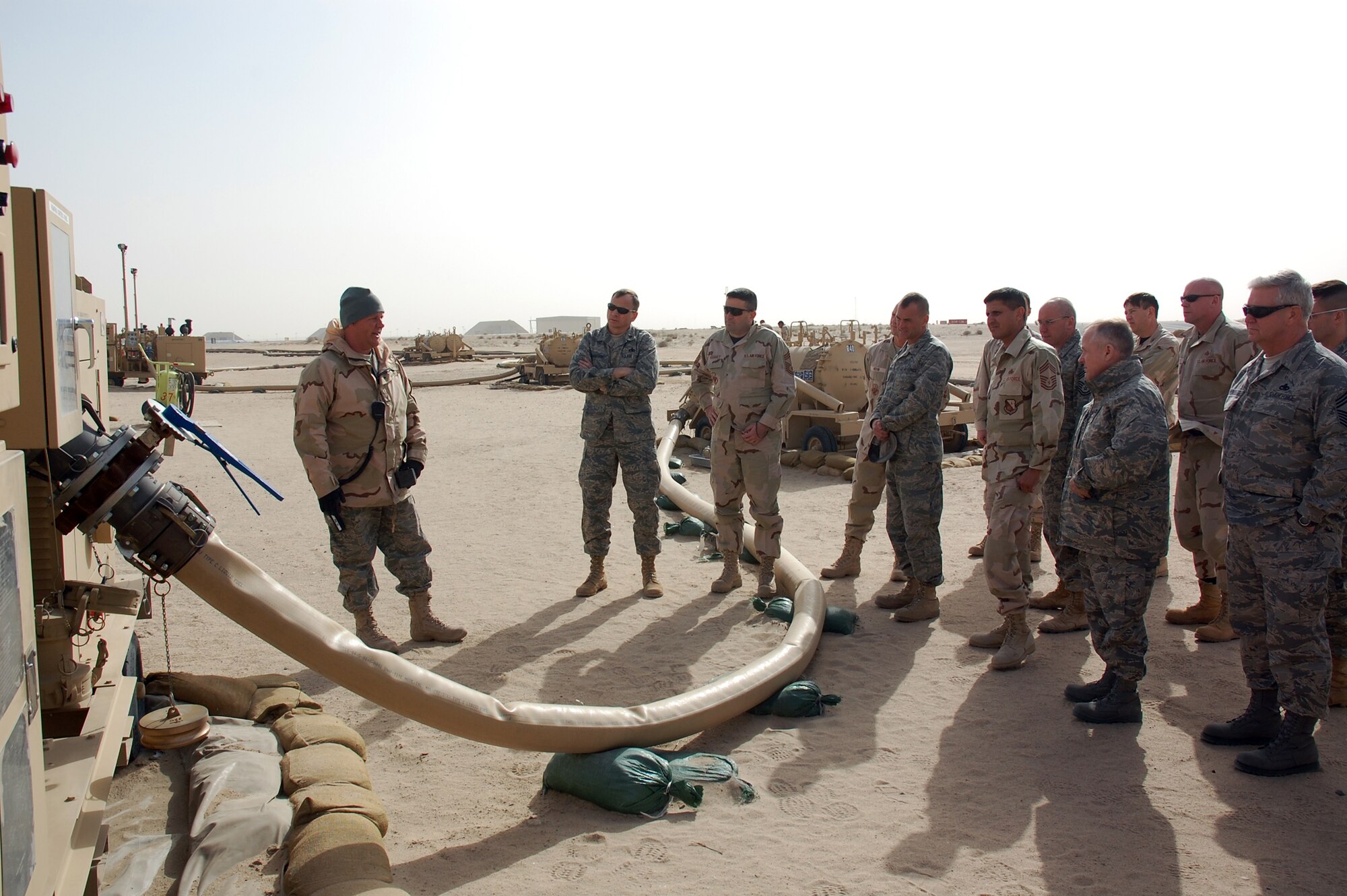 Tech. Sgt. Dennis Wallace briefs logistics and maintenance senior leaders about the R-18 fuel pump used to refuel aircraft Feb. 3. The senior leaders attended the Central Command Air Forces Expeditionary Maintenance Group Conference. Sergeant Wallace is deployed to the 386th Expeditionary Logistics Readiness Squadron. (U.S. Air Force photo/Capt. Jason McCree) 
