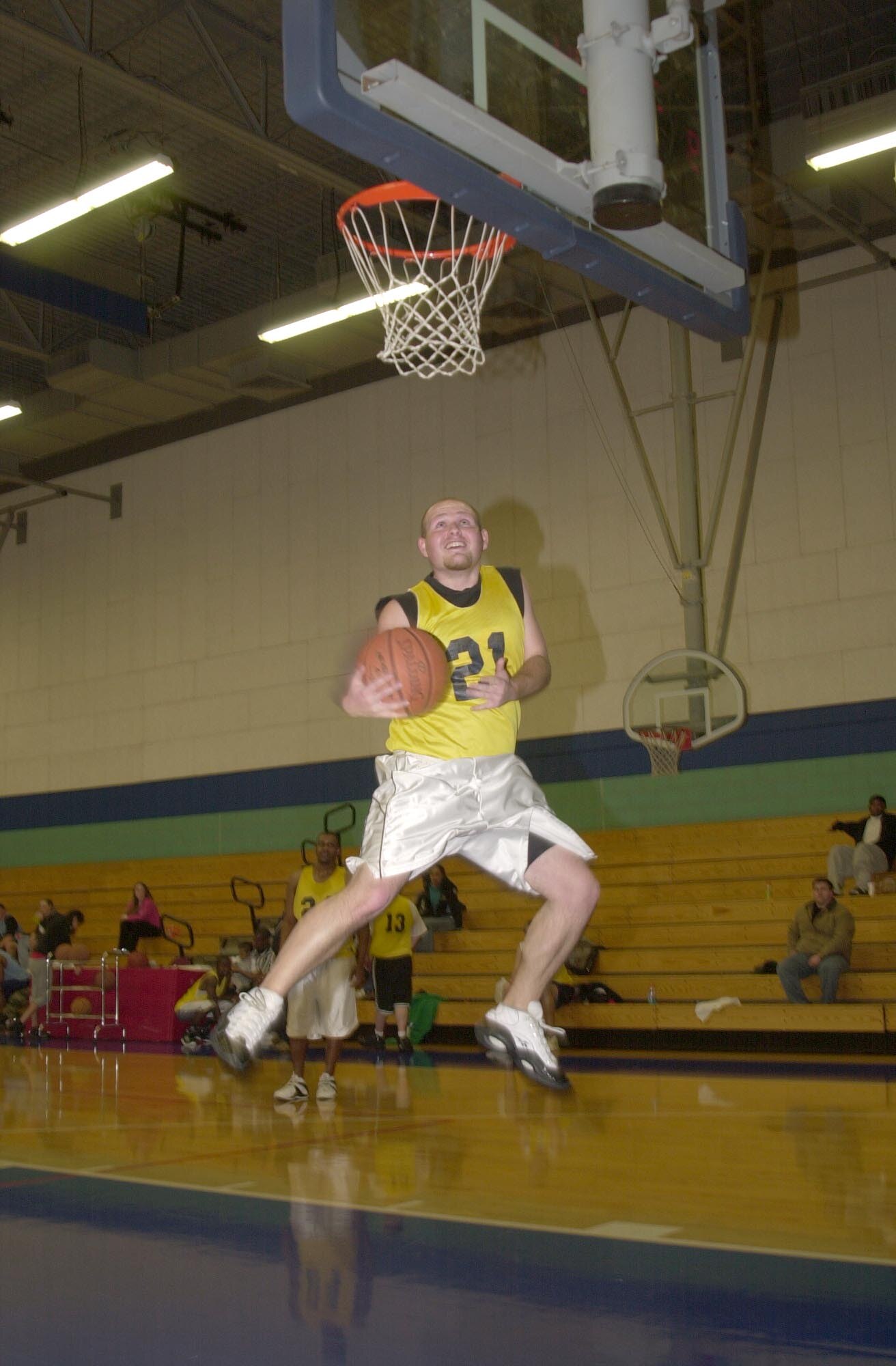 Point Guard Brian Stansbury (U.S. Air Force photo by Senior Airman Luis Loza Gutierrez)