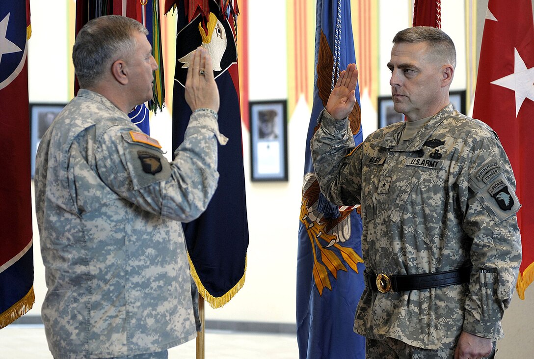 Gen. Richard A. Cody, Army vice chief of staff, administers the oath of office to newly promoted Brig. Gen. Mark Milley, deputy commander of operations for the 101st Airborne Division Air Assault, during a promotion ceremony on Fort Campbell, Ky., Feb. 1, 2008.  