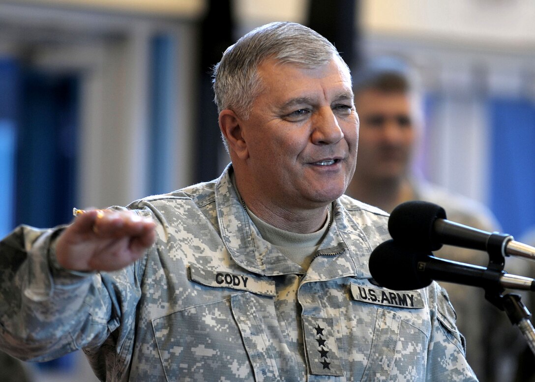 Gen. Richard A. Cody, Army vice chief of staff, addresses the audience during the promotion ceremony of newly sworn in Brig. Gen. Mark Milley, deputy commander of operations for the 101st Airborne Division Air Assault, on Fort Campbell, Ky., Feb. 1, 2008.  