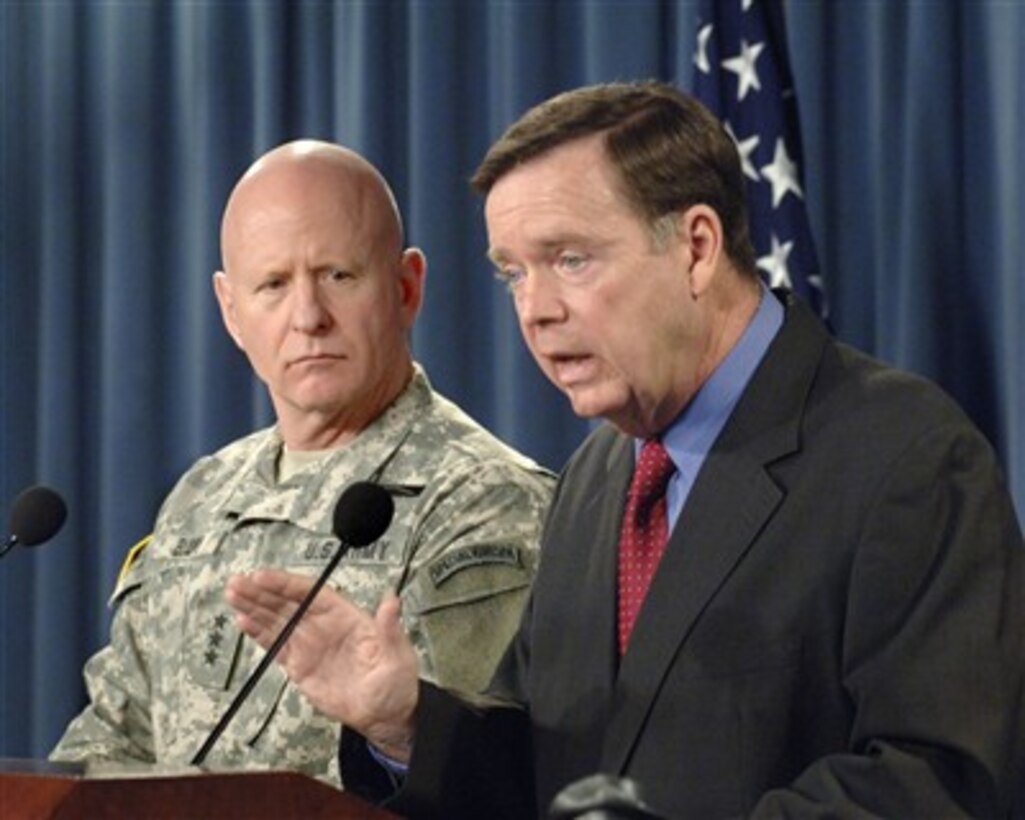 Assistant Secretary of Defense for Homeland Defense Paul McHale (right) and Chief of the National Guard Bureau Lt. Gen. H. Steven Blum (left), U.S. Army, conduct a press conference in the Pentagon to discuss the report by the Commission on the National Guard and Reserves on Feb. 1, 2008.  