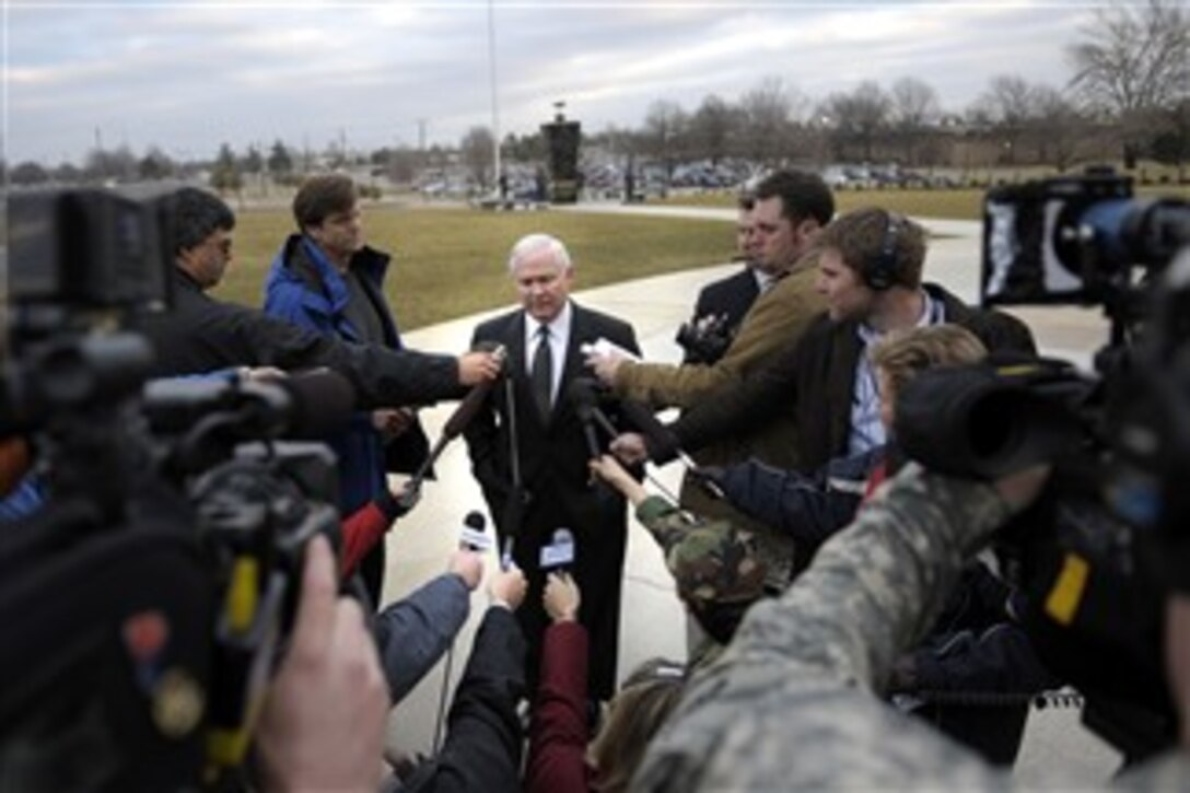 Defense Secretary Robert M. Gates speaks with members of the press after talking with deploying troops and their spouses at Fort Campbell, Ky., Feb. 1, 2008.