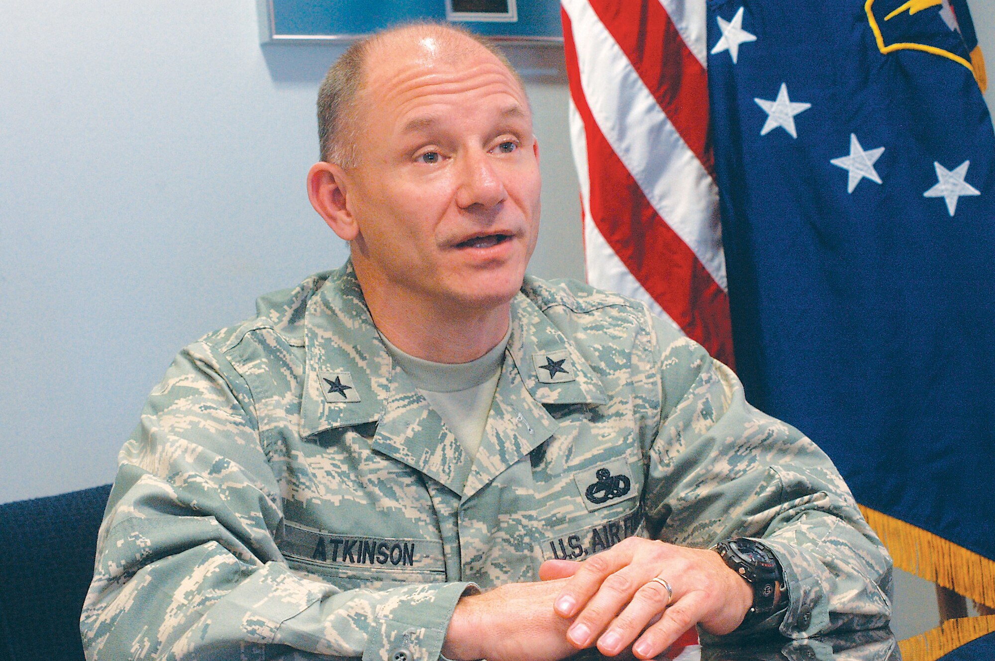 Brig. Gen. Mark Atkinson, 402nd Maintenance Wing commander, sits down for an interview with the Robins Rev-Up Dec. 6, 2007. U. S. Air Force photo by Sue Sapp