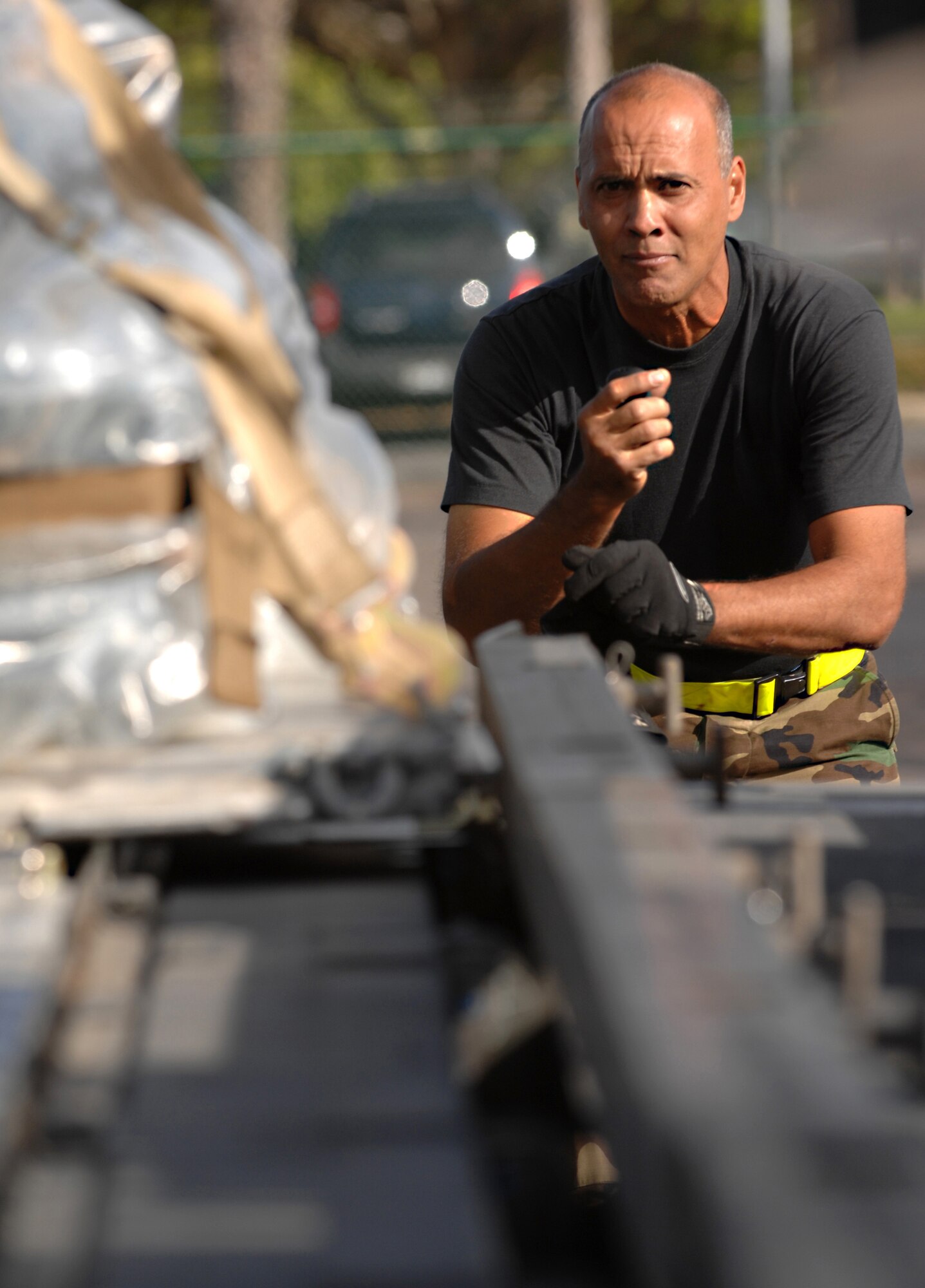 U.S. Air Force Tech. Sgt. Jay J. Perez, an aerial port specialist with the 44th Aerial Port Squadron, Andersen Air Force Base, Guam, loads a pallet container of meals, ready to eat packages during Pacific Lifeline on Hickam Air Force Base, Hawaii, Jan. 29, 2008. Pacific Lifeline trains personnel to deploy in response to a humanitarian assistance or disaster scenario. (U.S. Air Force photo by Airman 1st Class Jimmy L. Dang)