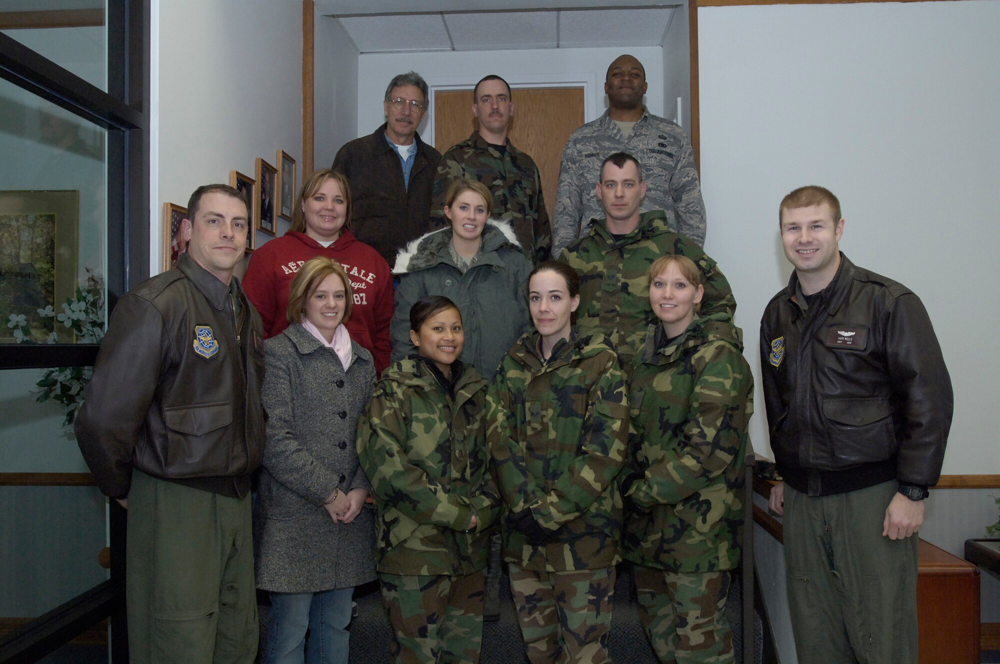 FAIRCHILD AIR FORCE BASE, Wash. - A group of wing annual awards winners pose for a group photo after their incentive flight Feb. 4. The winners were taken on a three hour flight to congratulate them on their achievements. (U.S. Air Force photo/Senior Airman Eunique Stevens)