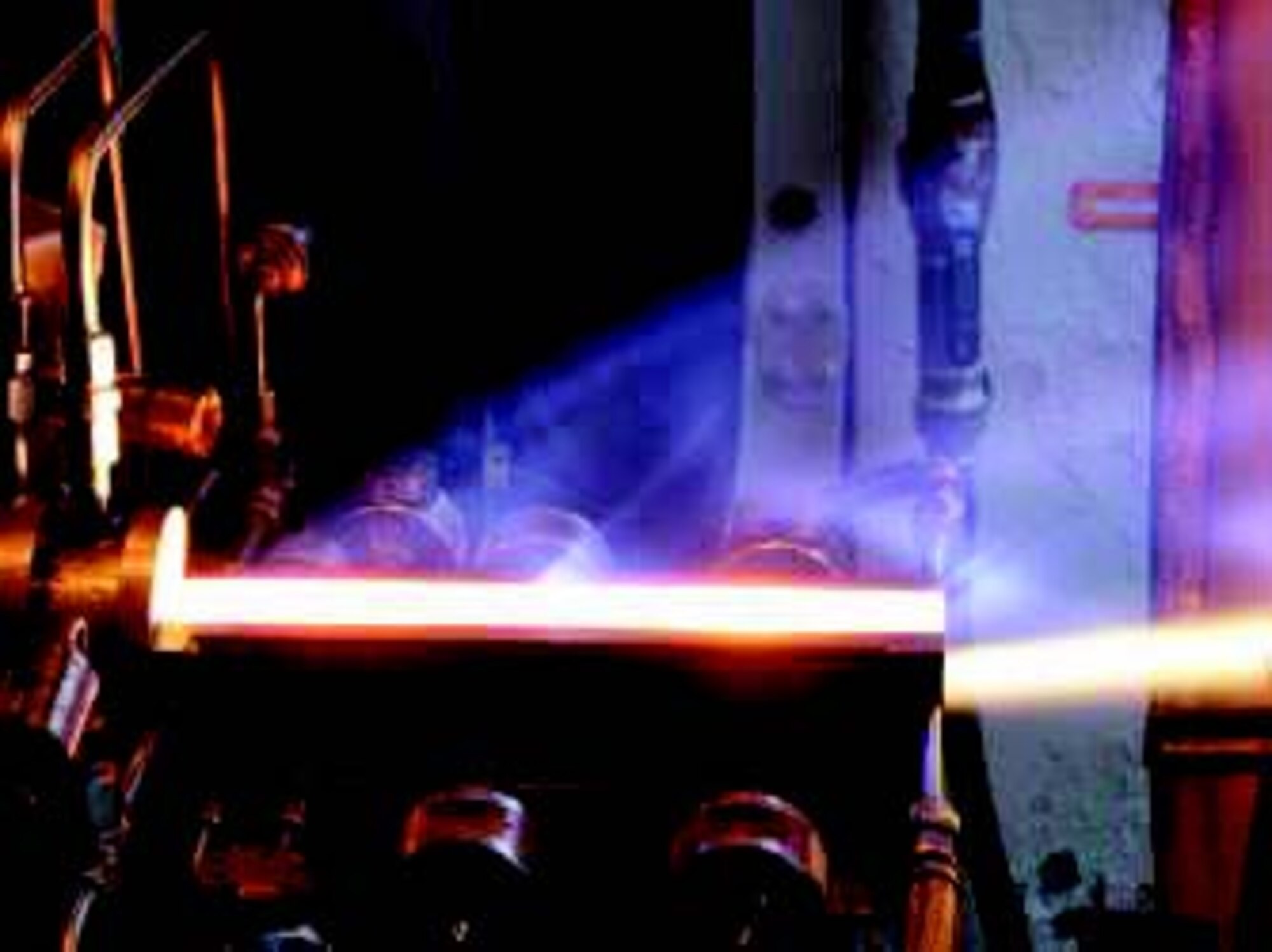 A cooled ceramic matrix composite panel undergoes a hot-fire test at the National Aeronautics and Space Administration’s Glenn Research Center.