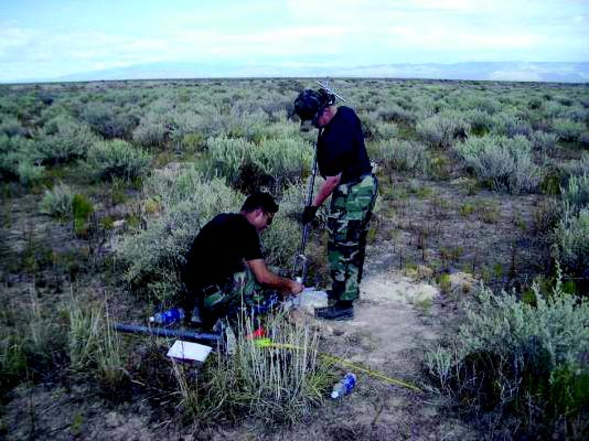 Researchers from the Air Force Civil Engineering Service Agency conduct soil testing.
