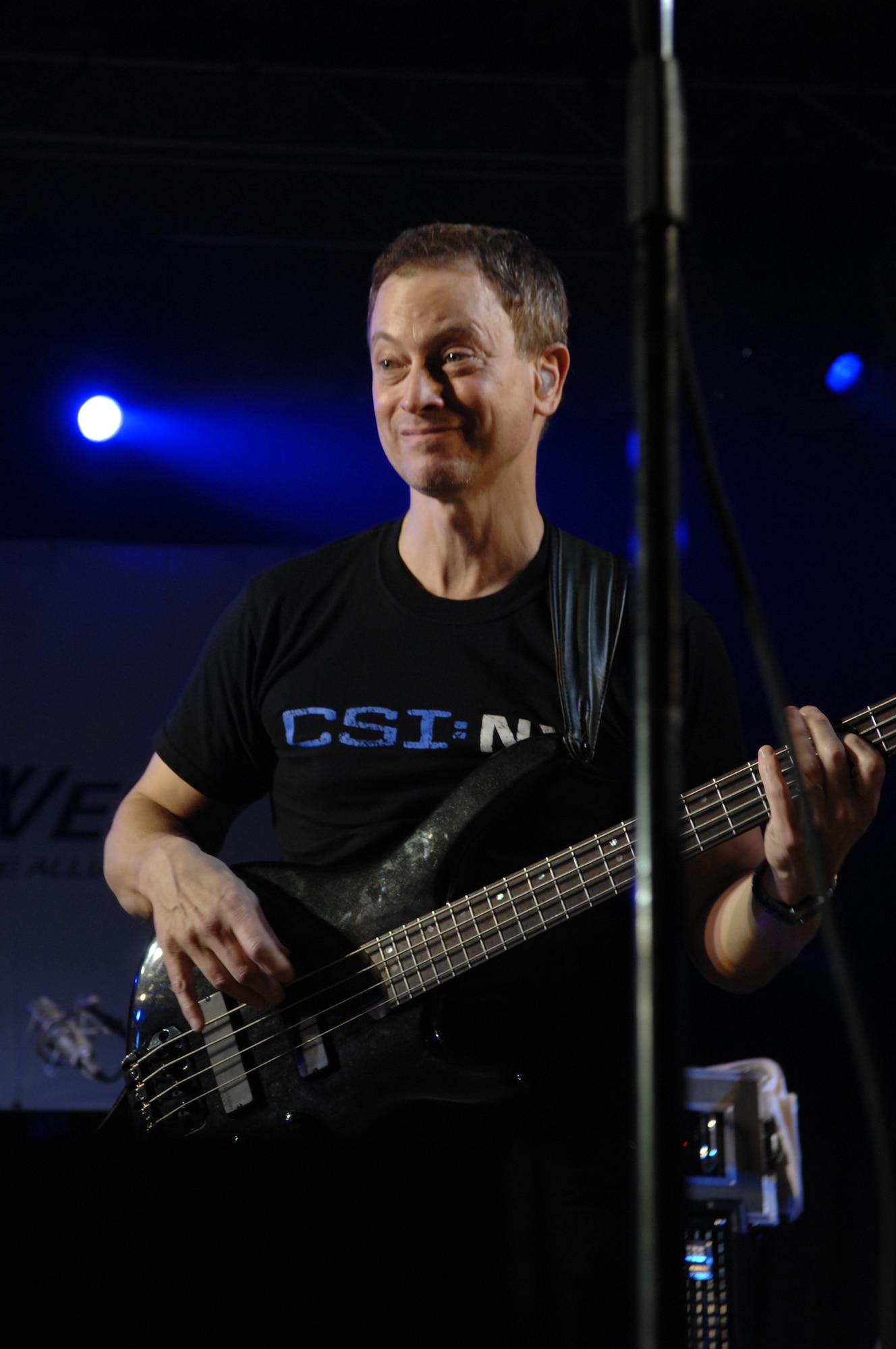 Gary Sinise of the Lt. Dan Band plays the bass for the United Service Organizations entertainment tour at Ellsworth Air Force Base, S.D., Feb. 1, 2008. The private concert for U.S. troops is the first this year in the series of stateside USO tours. (U.S. Air Force photo By Senior Airmen Angela Ruiz) 
