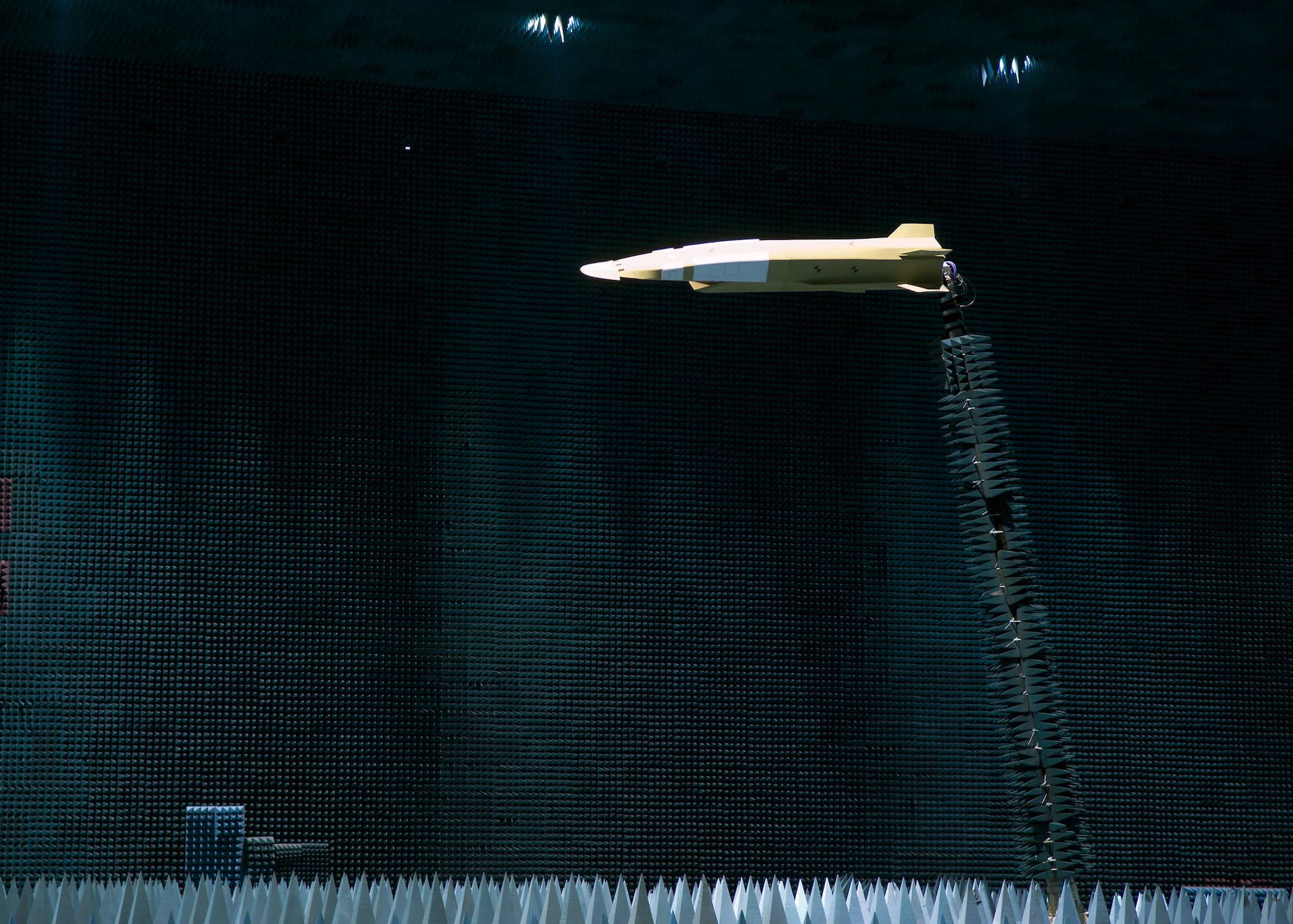 An X-51 Scramjet-Waverider mock-up hangs inside the Benefield Anechoic Facility during the vehicle's antenna testing Jan. 29 at Edwards Air Force Base, Calif. The 412th Test Wing Hypersonic Flight Test Team, Electronic Warfare and Boeing began the month-long testing Jan. 28. (U.S. Air Force photo/Mike Cassidy) 