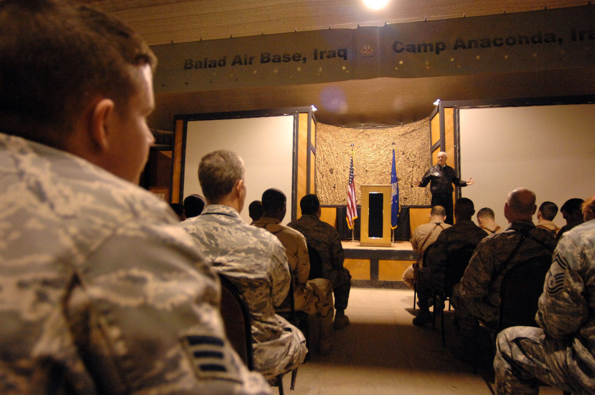 Secretary of the Air Force Michael Wynne speaks to Balad Airmen about the importance of their service here, Feb. 2. Secretary Wynne answered questions during an Airmen's Call on the topics of in-lieu-of taskings, the future of airpower, as well as the current and future changes on the horizon for basic training. (U.S. Air Force photo/Senior Airman Julianne Showalter)