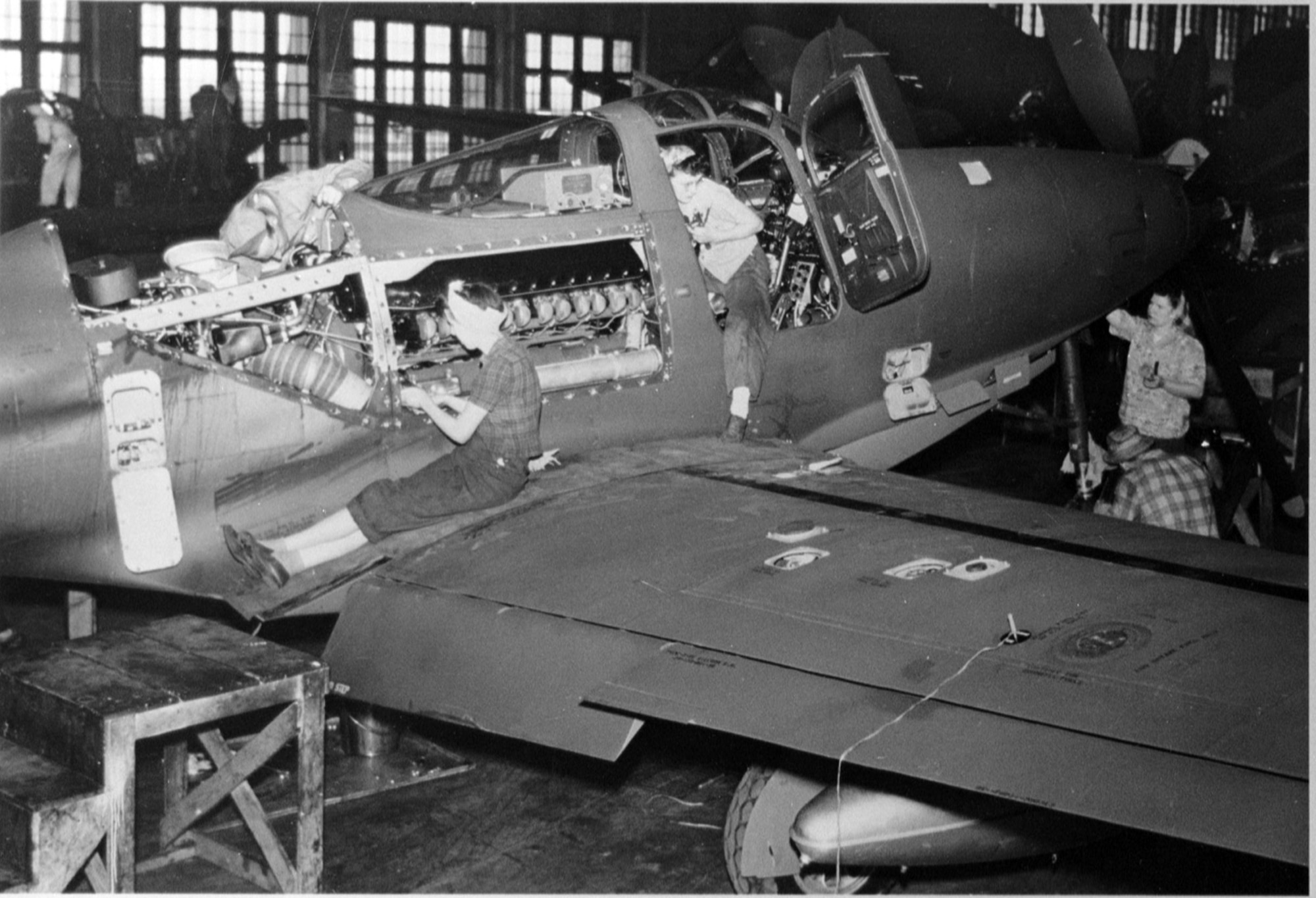 A maintenance crew comprised of women process a P-63 in the final processing hanger at Great Falls Army Air Base June 1945. (Photo courtesy of the Malmstrom Museum)