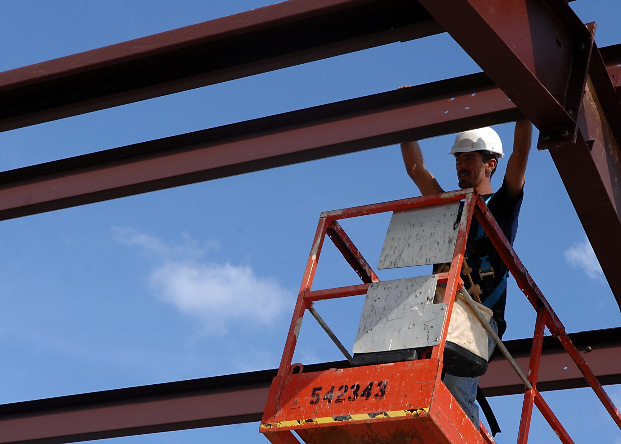 MOODY AIR FORCE BASE, Ga. -- A contractor working for Whitesell-Green Inc. inspects a girder at the site of the new A-10C weapons release shop here Feb. 4. The new building will provide needed work-space for workcenters that arrived here from Pope AFB, N.C in 2007. (U.S. Air Force photo by Airman 1st Class Brittany Barker)