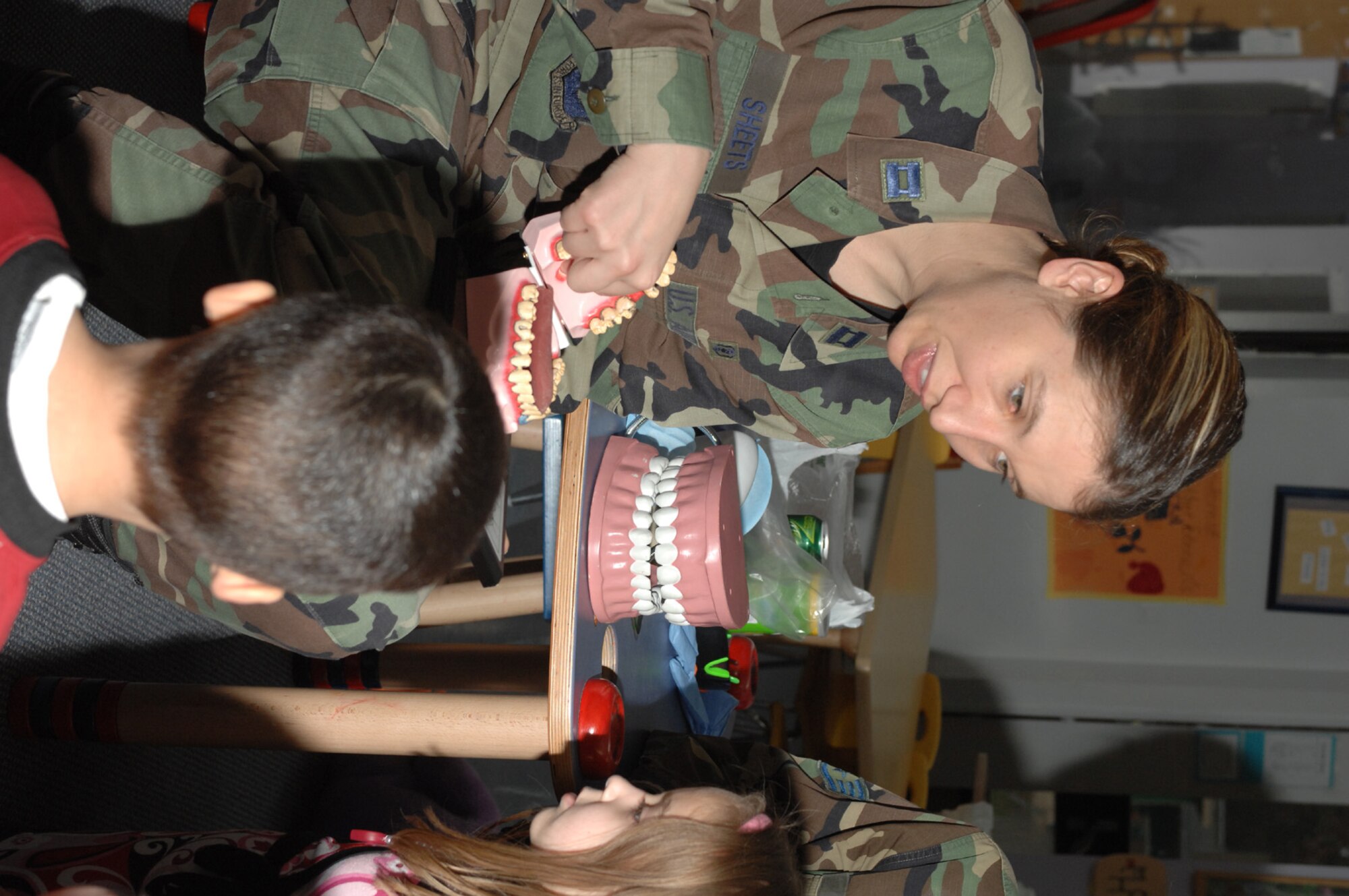 SPANGDAHLEM AIR BASE, Germany – Capt. Christina Sheets, 52nd Dental Squadron, shows preschoolers what unhealthy teeth look like during a demonstration at the Children's Development Center for Children's Dental Health Month Feb. 5, 2008. (U.S. Air Force photo/Senior Airman Kristin Ruleau)