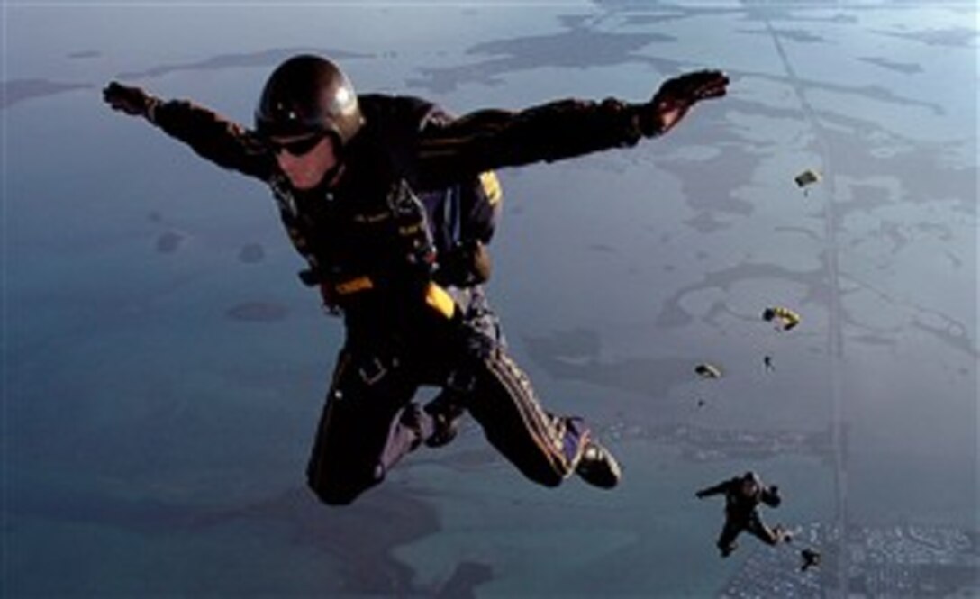 Chief Petty Officer  J.C. Ledbetter, a member of "Leap Frogs," the U.S. Navy Parachute Team, jumps over Naval Air Station Key West, Jan. 30, 2008. 