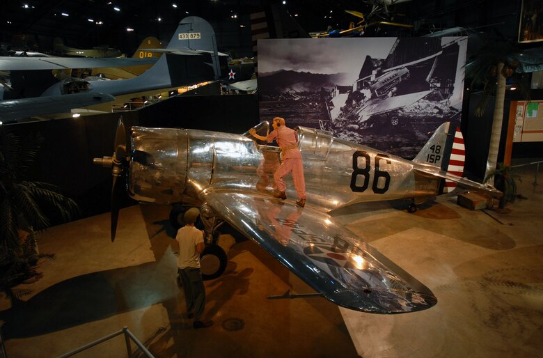 The Curtiss P-36A at the National Museum of the United States Air Force depicts a pajama-clad Rasmussen (U.S. Air Force)