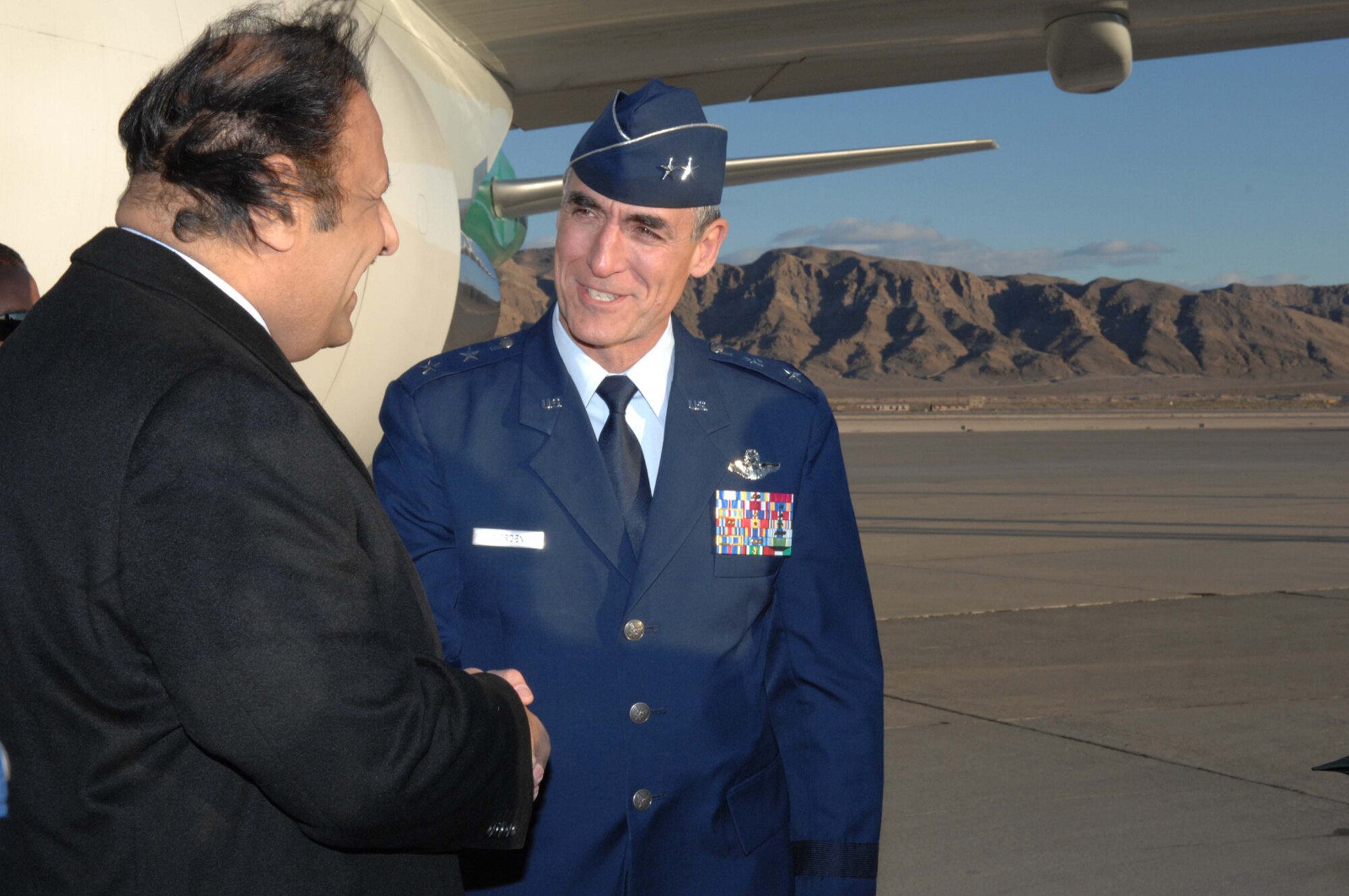 NELLIS AIR FORCE BASE, Nev.—Maj. Gen. Mike Worden, United States Air Force Warfare Center commander, greets His Royal Highness Prince Khalid bin Abdul Aziz Al-Saud here Feb. 4. The prince, who is the Assistant Minister of Defense and Aviation for Military Affairs, arrived at Nellis to observe the Royal Saudi air force's participation during the ongoing Red Flag exercise. (U.S. Air Force photo by Senior Airman Larry E. Reid Jr.)