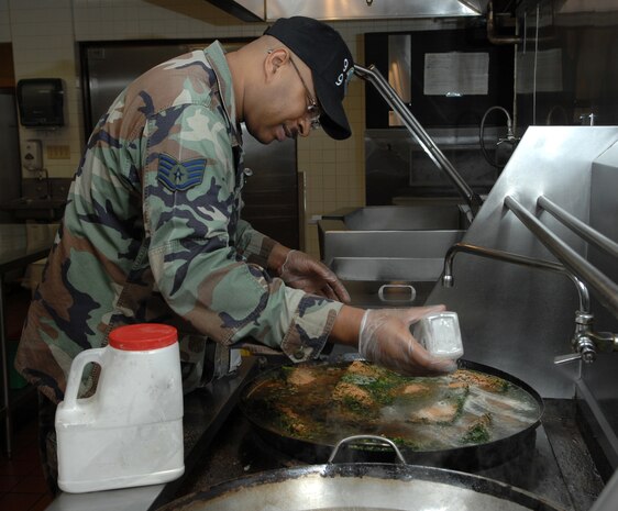 NELLIS AIR FORCE BASE, Nev.—Staff Sgt. Lloyd Richards, 99th Services Squadron, seasons vegetables in preparation for the lunch rush at the Crosswinds Dining Facility here Feb. 6. The 99th SVS captured the 2008 Air Combat Command General Curtis E. LeMay Services Award here Jan. 25 for the third time in four years. (U.S. Air Force photo by Staff Sgt. Scottie T. McCord)