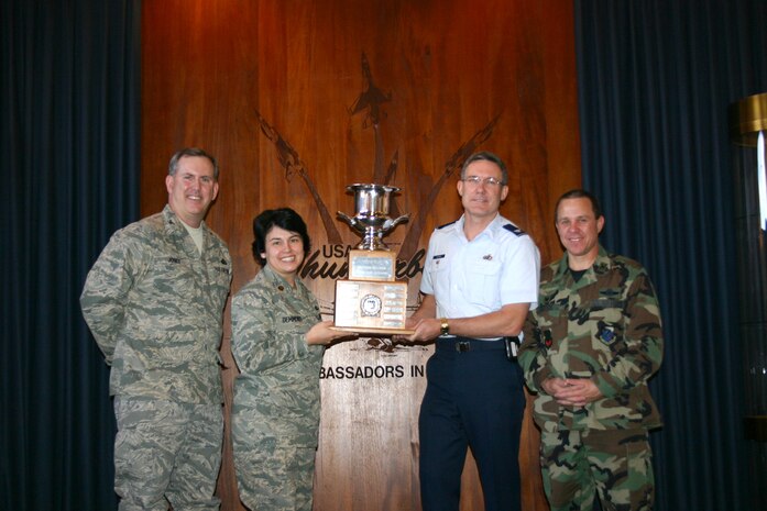 NELLIS AIR FORCE BASE, Nev.—(from left to right) Col. Stephen Jones, Air Combat Command Manpower Personnel Services deputy director, Maj. Beth Demmons, 99th Services Squadron commander, Col. Kenneth Keskel, 99th Air Base Wing vice commander, and Col. Greg Dodson, 99th Mission Support Group commander, pose with the 2008 Air Combat Command General Curtis E. LeMay Services Award here Jan. 25. This marks the third time in fours years that the 99th SVS has captured the award. (Courtesy photo)