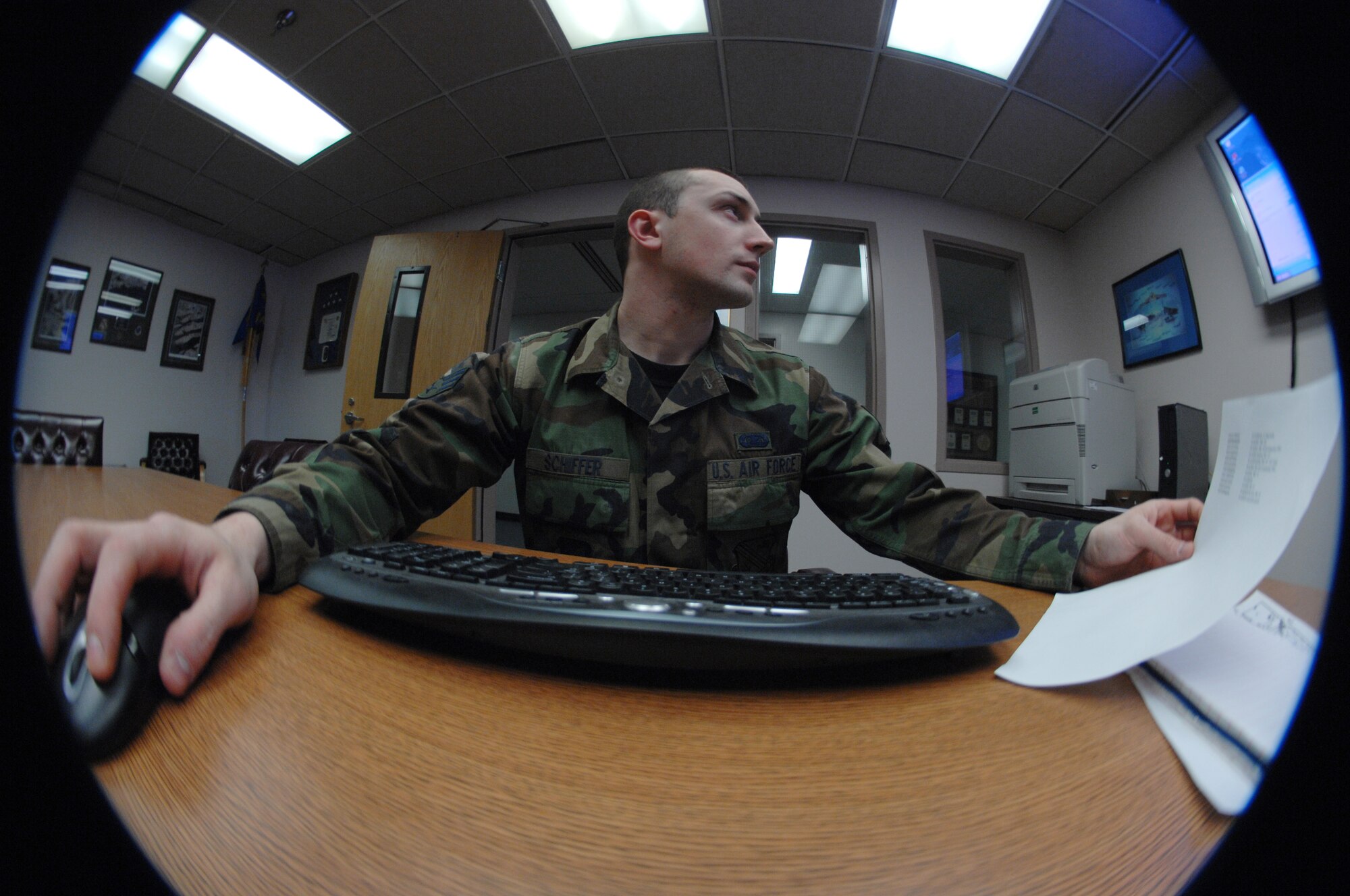 EIELSON AIR FORCE BASE, Alaska -- Senior Airman Adam Schiffer, 354th Operations Group client support administrator, changes the name of a computer from 13 to 14 characters due to the Air Force naming convention Feb. 5, 2008, at the 18th Aggressor Squadron. Airman Schiffer maintains computers in four different squadrons and as a CSA also performs tasks such as records management training and information assurance for the units they are assigned to. (U.S. Air Force photo by Airman 1st Class Christopher Griffin) 