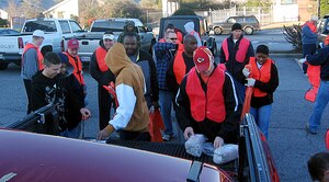 On Feb. 2, more than 30 Airmen and family members from the Air Force Sergeants Association and the Charleston AFB Top 3 participated in the first Team Charleston "Adopt-A-Highway" program this year. More than 70 trash bags were collected totaling more than 1,000 pounds. Last year the AFSA and the Top 3 "Adopt-A-Highway" program had more than 200 volunteers in the Charleston area. They collected more than 75,000 pounds of trash in 2007. (U.S. Air Force photo / Master Sgt. David Stinard)