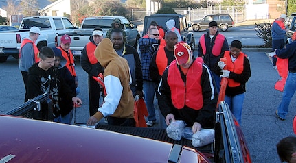 On Feb. 2, more than 30 Airmen and family members from the Air Force Sergeants Association and the Charleston AFB Top 3 participated in the first Team Charleston "Adopt-A-Highway" program this year. More than 70 trash bags were collected totaling more than 1,000 pounds. Last year the AFSA and the Top 3 "Adopt-A-Highway" program had more than 200 volunteers in the Charleston area. They collected more than 75,000 pounds of trash in 2007. (U.S. Air Force photo / Master Sgt. David Stinard)