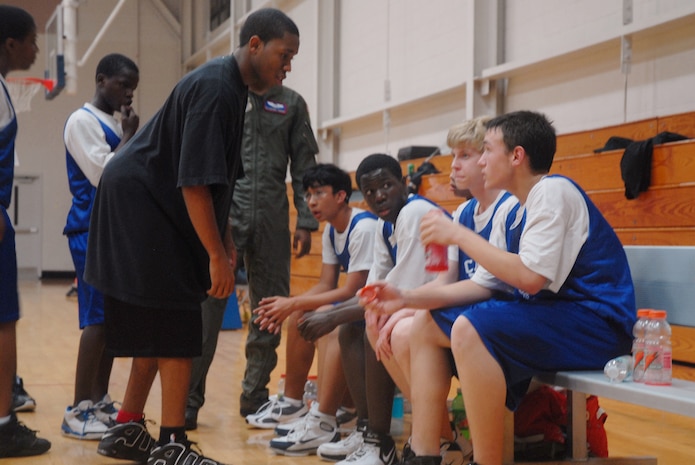 Alfonso Rogers, coach of the Charleston AFB Mavericks basketball team, talks to his players during a basketball game at the Sports and Fitness Center Feb. 4.  The Mavericks lost to the Moncks Corner Bulls with a final score of 47-51. (U.S. Air Force photo/Staff Sgt. Jennifer Arredondo)