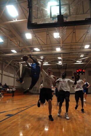 Lorimar Bowers, 14, of the Charleston AFB Mavericks basketball team attempts a shot during a Feb. 4 basketball game at the Sports and Fitness Center here. The Mavericks played against the Moncks Corner Bulls.  They lost to the Moncks Corner Bulls with a final score of 47-51. (U.S. Air Force photo/Staff Sgt. Jennifer Arredondo)