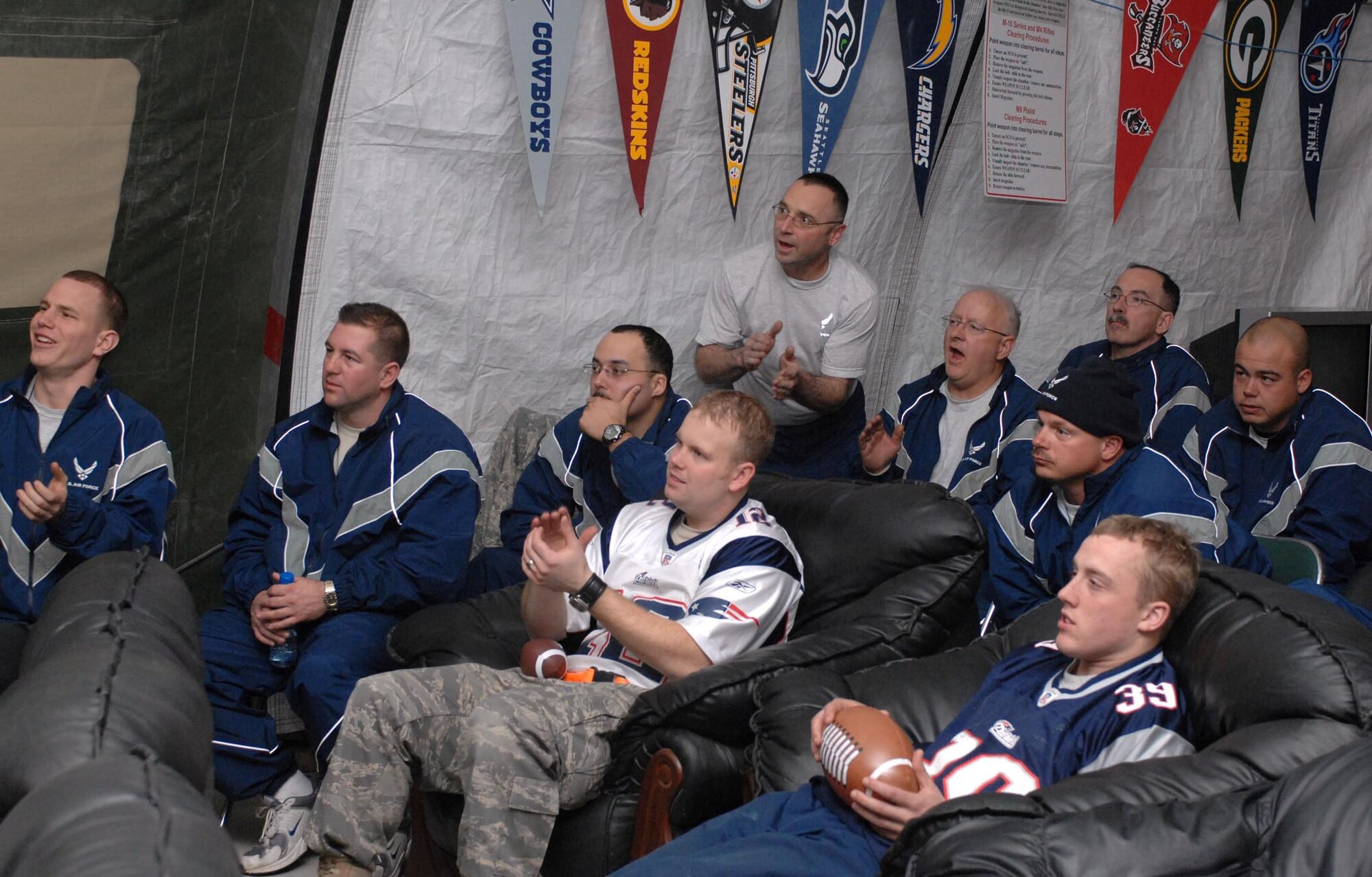 BAGRAM AIR BASE, Afghanistan?Airmen with the 58th Aerial Port Squadron from Westover Air Reserve Base, Mass. watch the Super Bowl here Feb. 4.  The Airmen are deployed in support of Operation Enduring Freedom. (US Air Force photo)