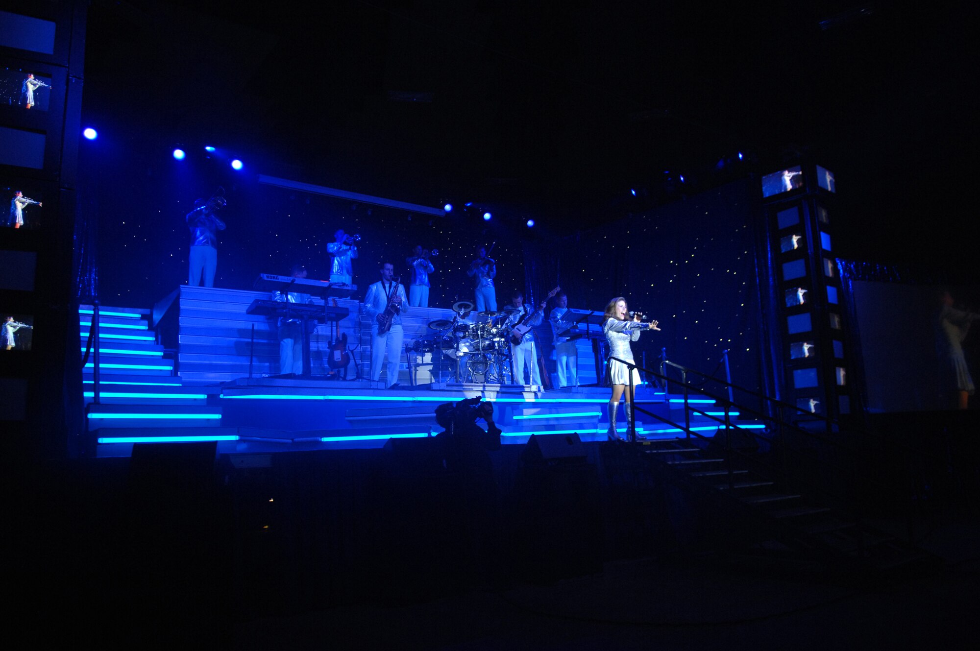 SEDALIA, Mo. – Tops in Blue perform “The Fly-By,” a musical tribute to 60 years of proud Air Force history at the Mathewson Exhibition Center at the Missouri State Fairgrounds Jan. 31.  (U.S. Air Force photo/Airman 1st Class Stephen Linch)
