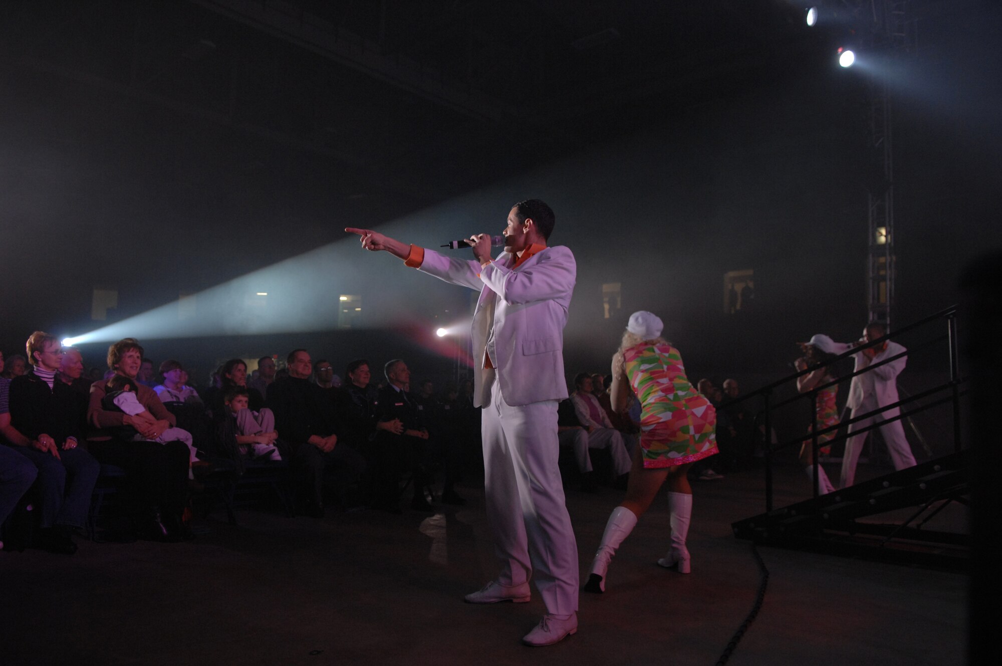 SEDALIA, Mo. – Tops in Blue perform “The Fly-By,” a musical tribute to 60 years of proud Air Force history at the Mathewson Exhibition Center at the Missouri State Fairgrounds Jan. 31.  (U.S. Air Force photo/Airman 1st Class Stephen Linch)

