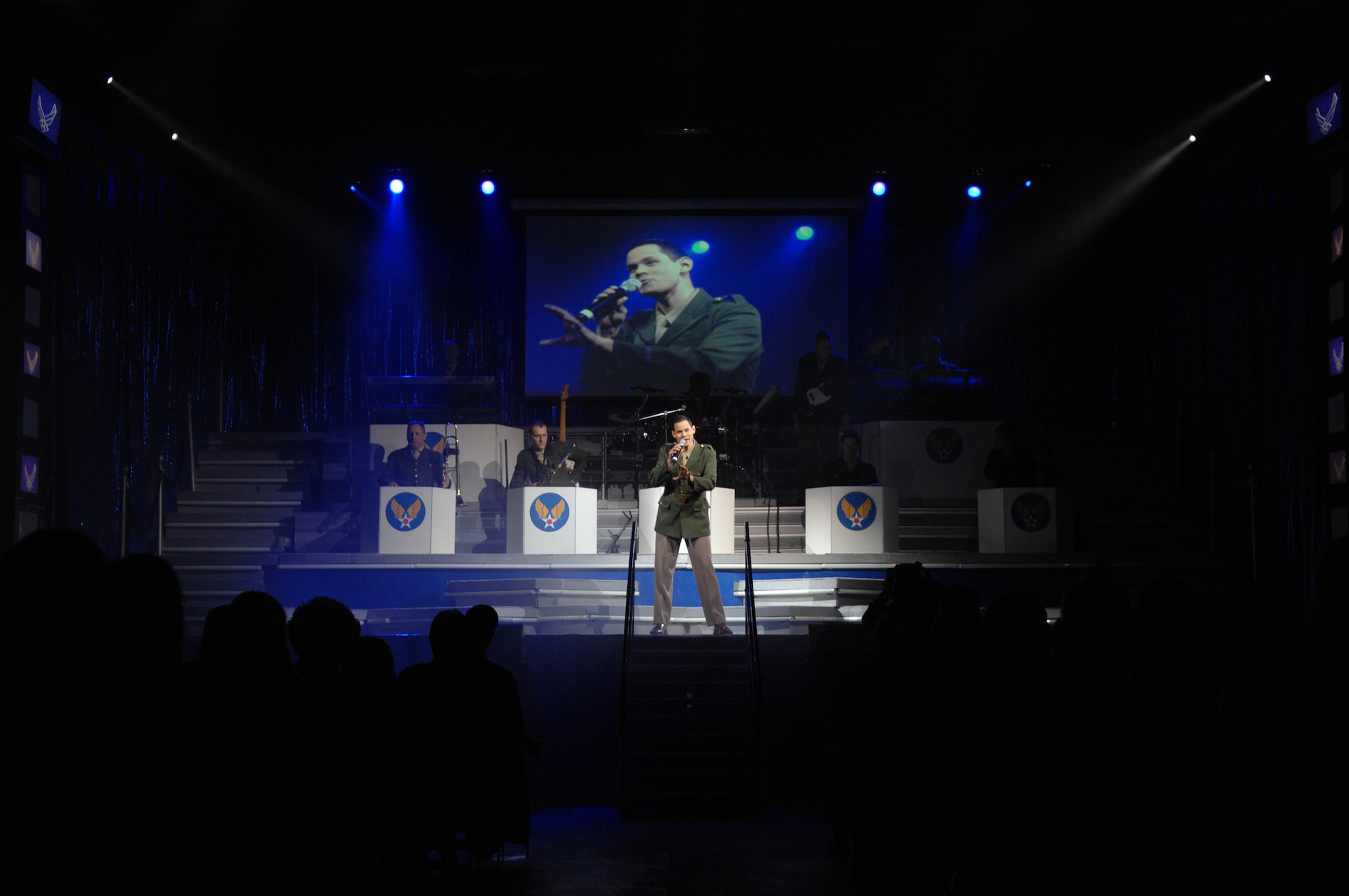 SEDALIA, Mo. – Tops in Blue perform “The Fly-By,” a musical tribute to 60 years of proud Air Force history at the Mathewson Exhibition Center at the Missouri State Fairgrounds Jan. 31. (U.S. Air Force photo/Airman 1st Class Stephen Linch)