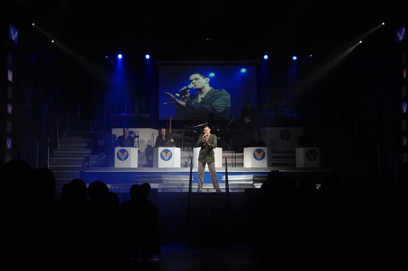 SEDALIA, Mo. – Tops in Blue perform “The Fly-By,” a musical tribute to 60 years of proud Air Force history at the Mathewson Exhibition Center at the Missouri State Fairgrounds Jan. 31. (U.S. Air Force photo/Airman 1st Class Stephen Linch)