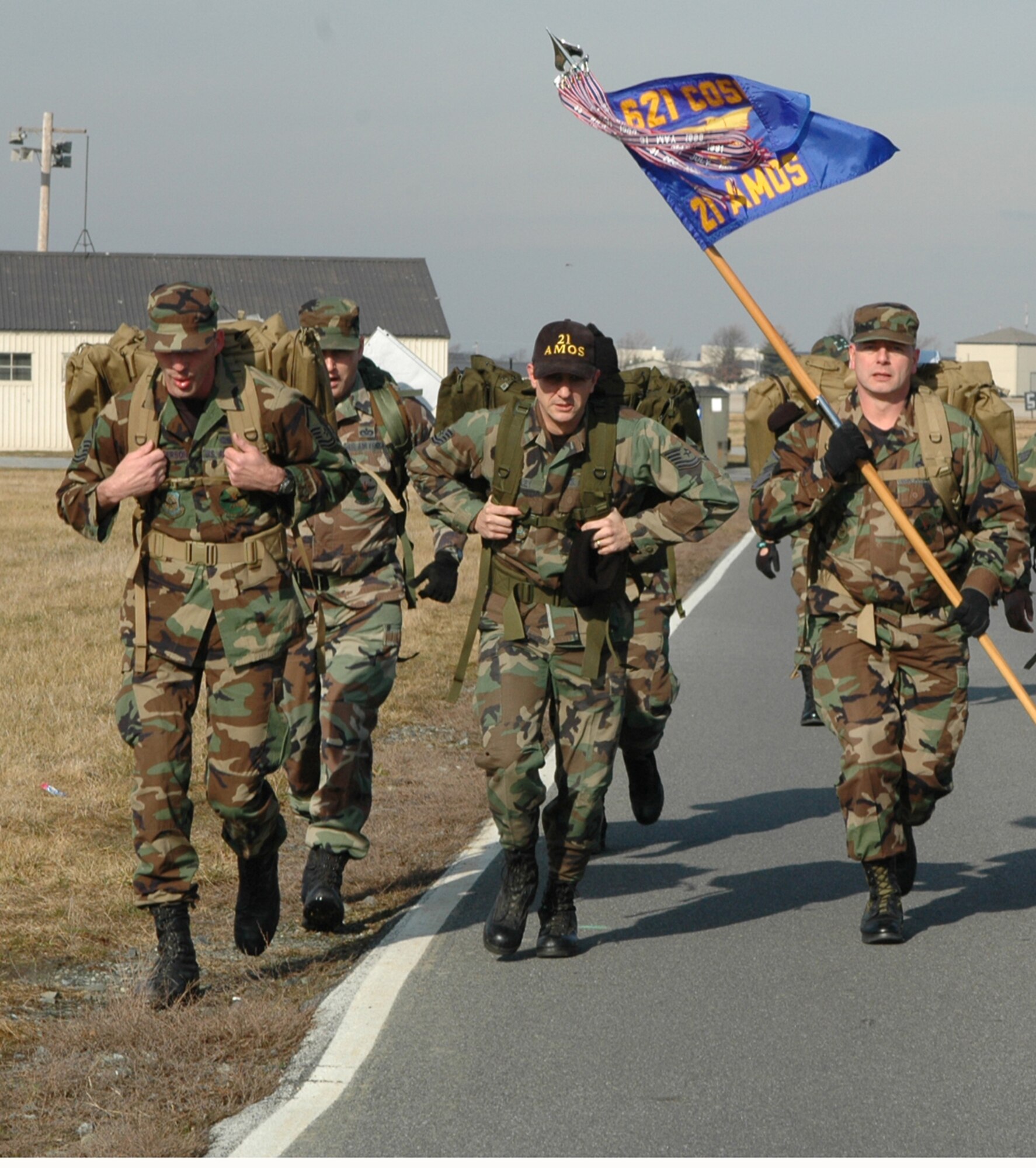 Airmen from the 21st Air Mobility Operations Squadron, Maguire Air Force Base, N.J., joined participants from Dover AFB, the Army, Marine Corps and several civilians to commemorate Veterans of the Korean War Battle of Chosin Reservoir in the 436th Security Forces Squadron sponsored 9th Annual Ruck March, Feb. 2 at the Air Mobility Museum here. (U.S. Air Force photo/Senior Airman Andria J. Allmond) 