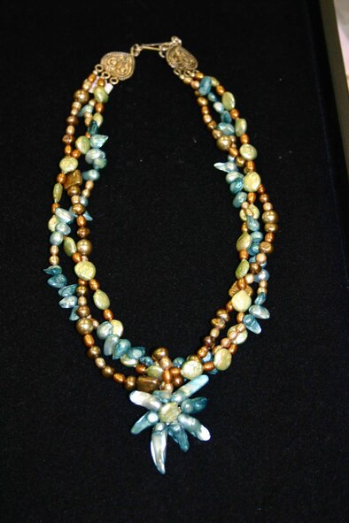  A beautiful, hand-made necklace created by an Alouette bead designer.  (Air Force photo by Jennifer D’Alessandro) 